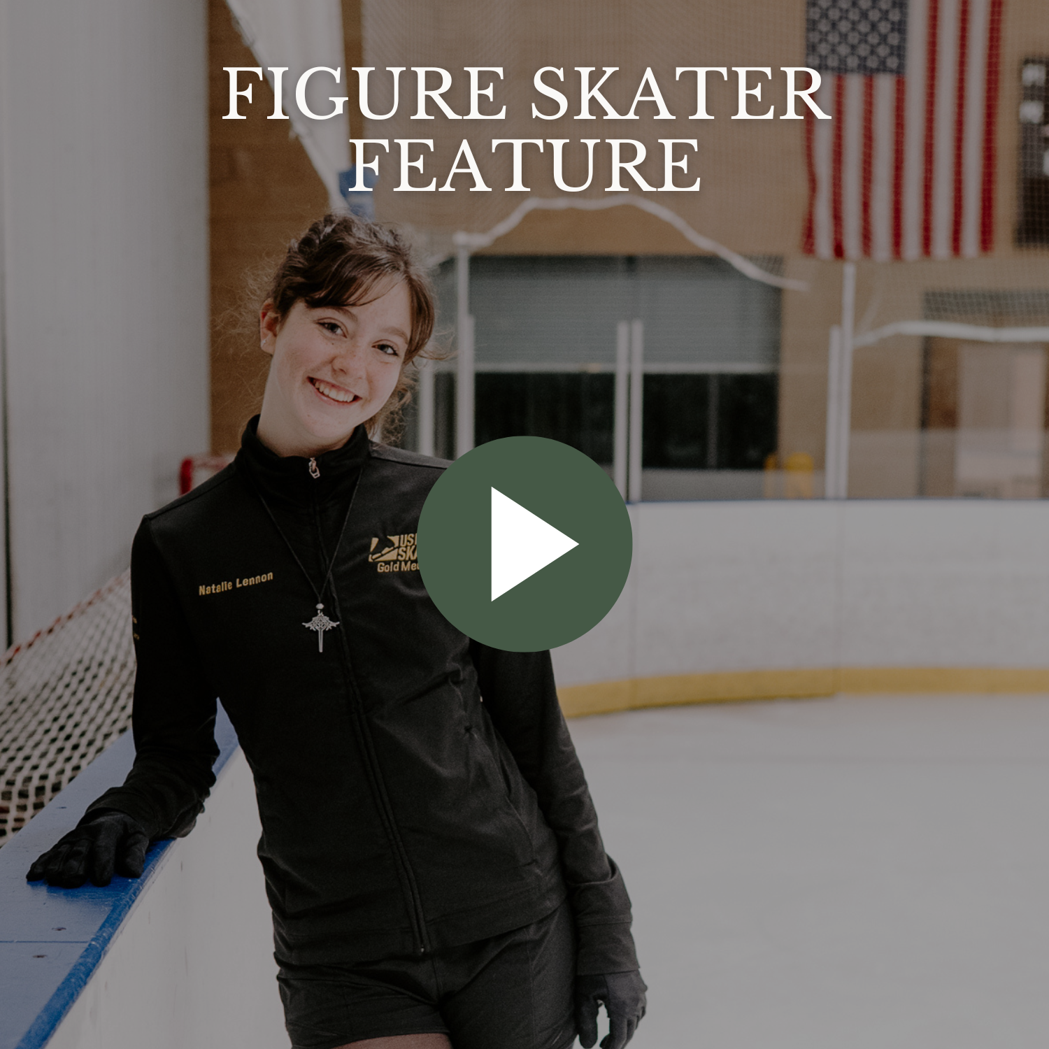 Young female figure skater on an ice rink, wearing a black jacket with her name 'Natalie Lennon' embroidered on it, smiling at the camera.