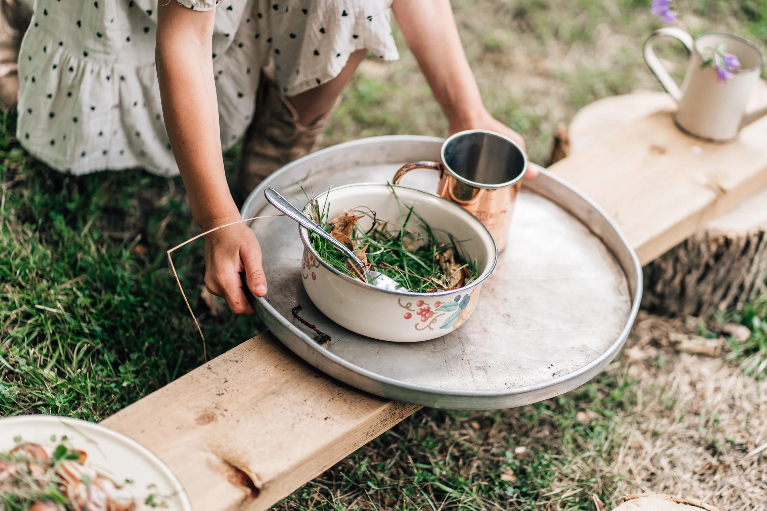 tray of nature soup and cup at the Belleville Outdoor Preschool