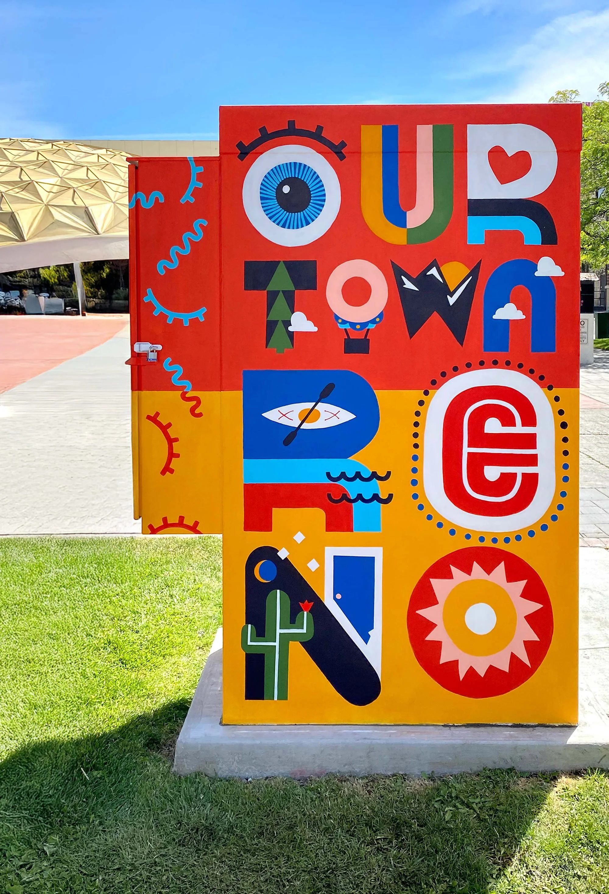 Colorful outdoor sign with illustrations and text that reads "You to Win" in a playful style.