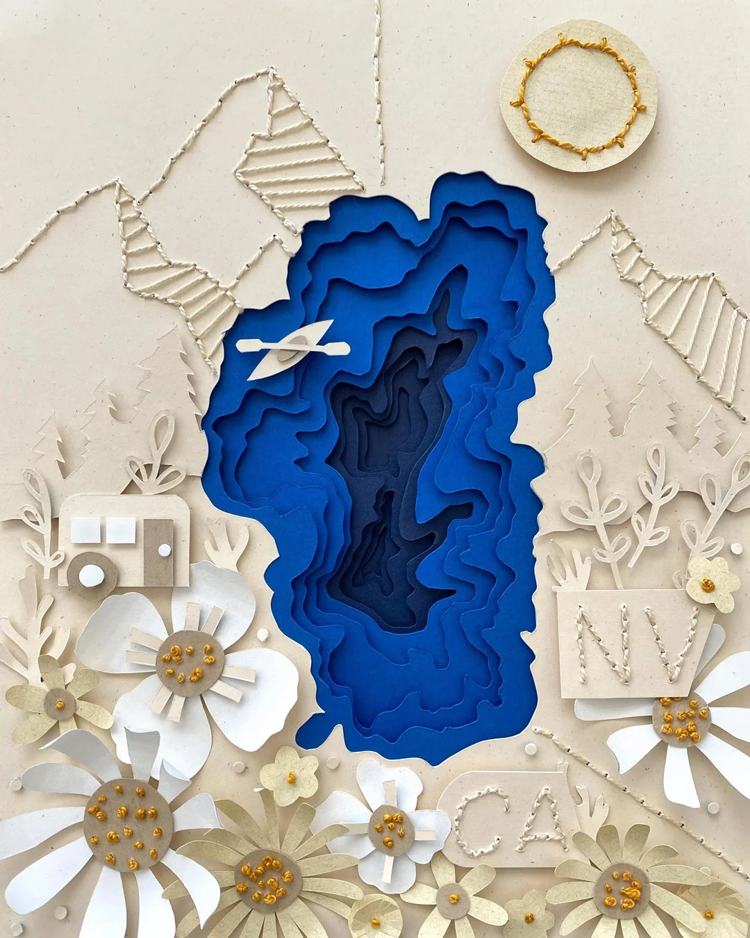 Paper art featuring a layered blue lake surrounded by white flowers, a camper, and a letter 'N' and 'A' on the bottom right, with a string art sun and DNA strand designs in the background.