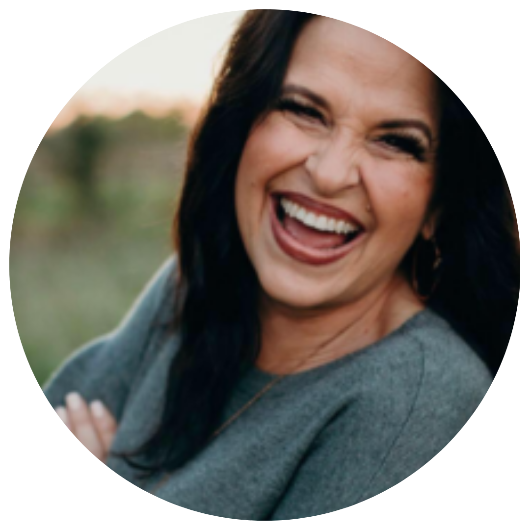 A woman with dark hair smiling