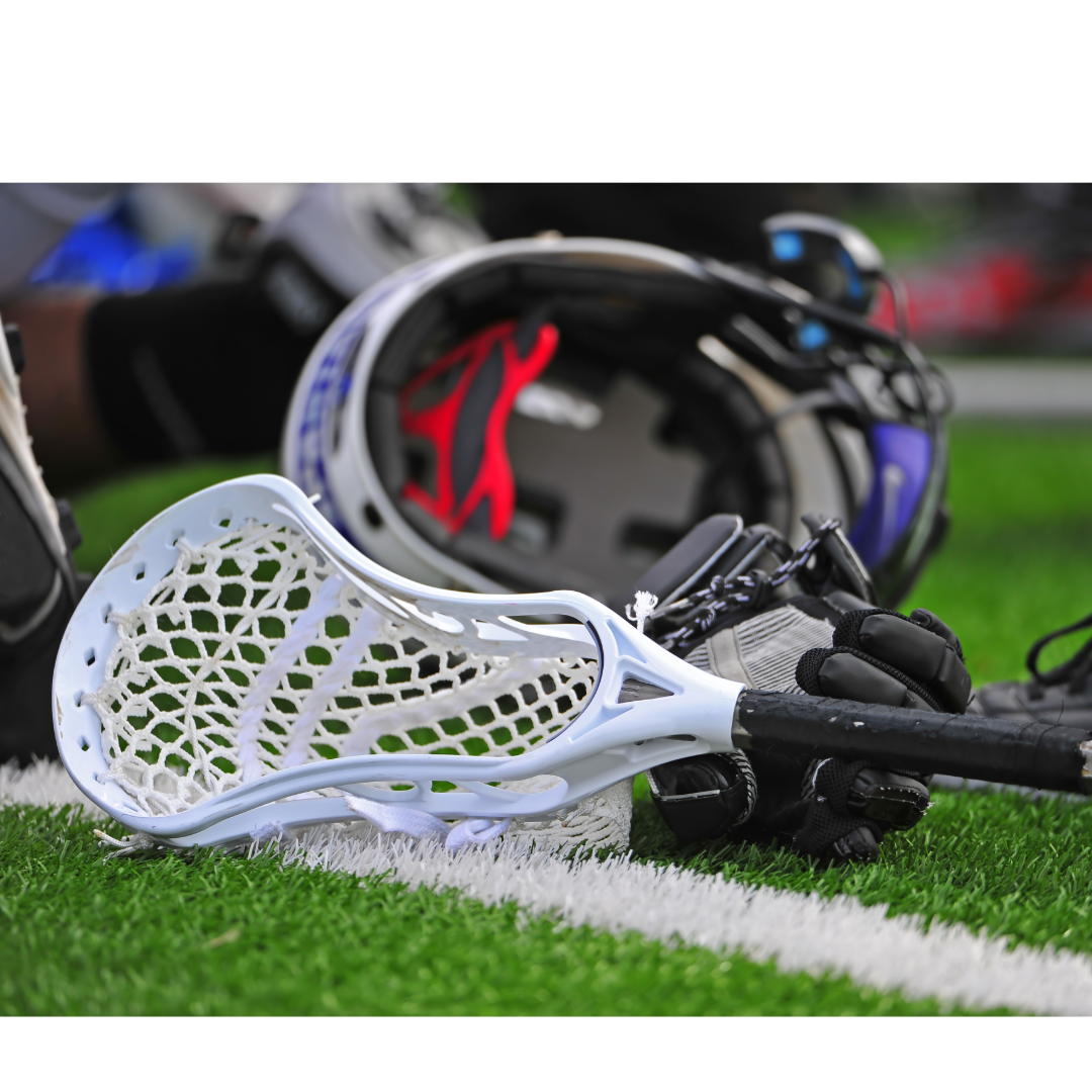 Lacrosse stick, helmet, gloves, padding on the field