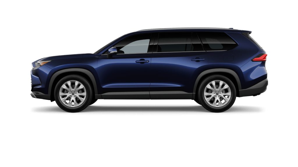 A side view of a blue SUV on a black background.