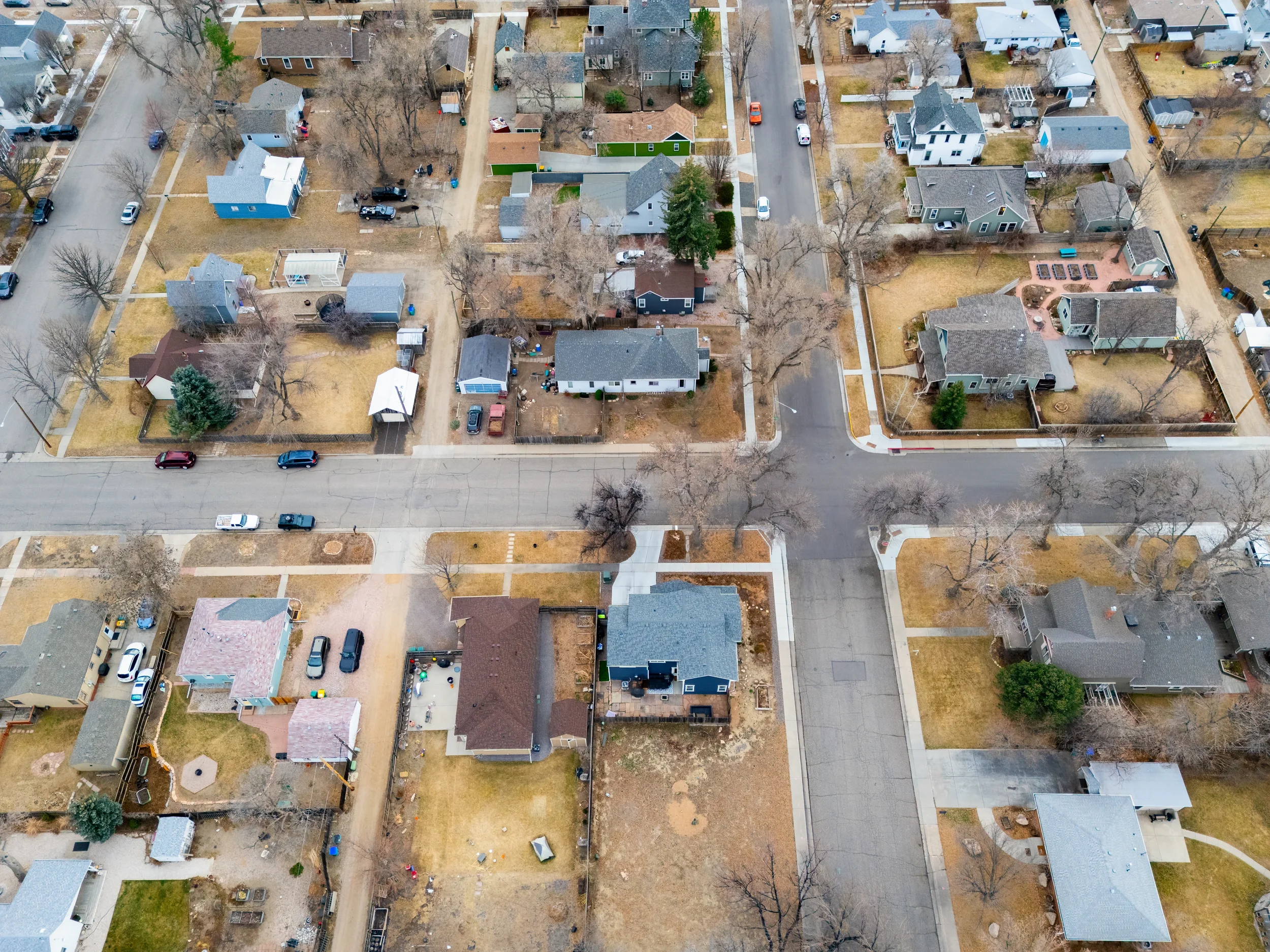 Aerial drone photography of a residential neighborhood in Berthoud, Colorado, showcasing home placements and street layouts.