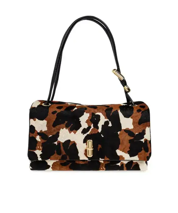 Marc Jacobs The Cow Haircalf Large Dual Bag featuring a western-inspired tri-color cow print
