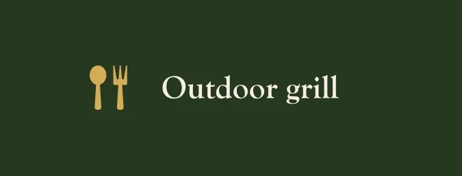 Green background with gold fork and spoon icons and the text 'Outdoor grill'.