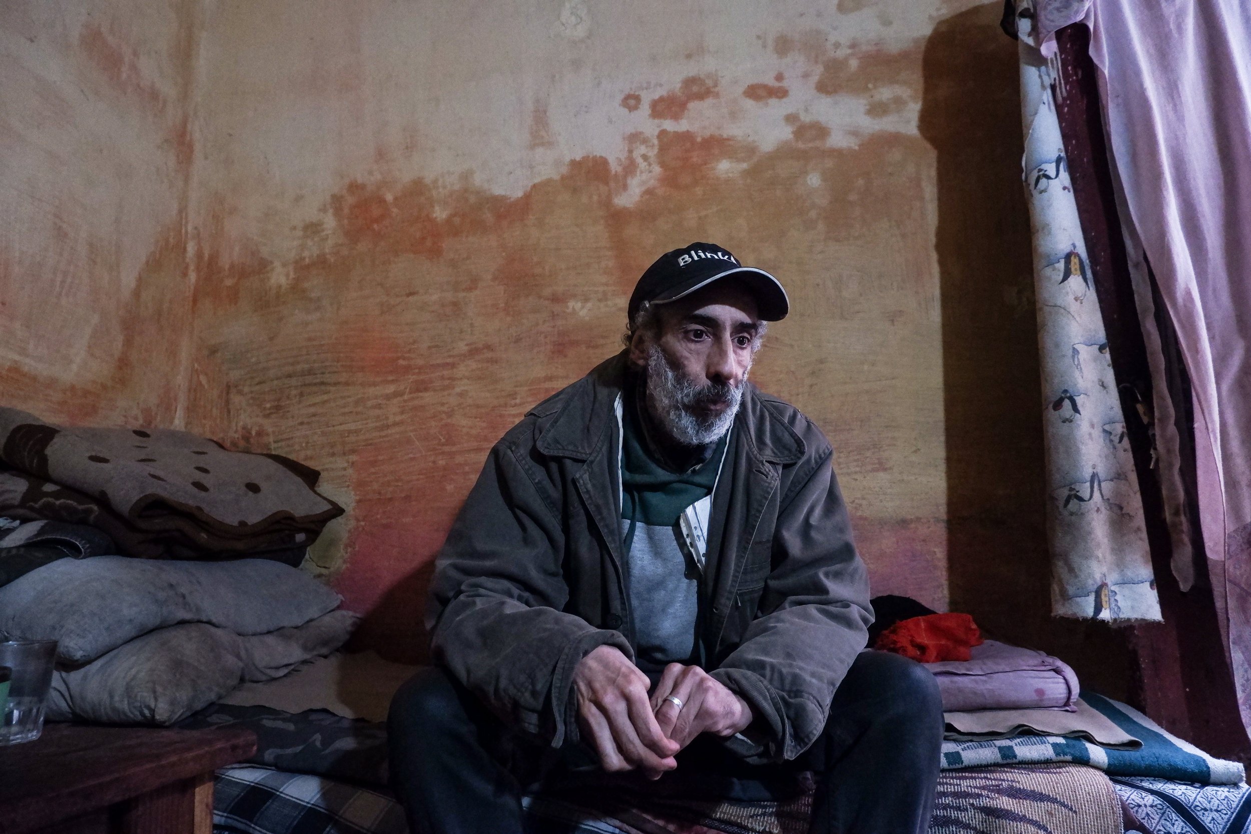 Salé, Funduq Hajji. For years, the families living here have been given promises of reconstruction that never materialize. Instead, life stays completely on hold inside rooms where the walls absorb the winter rain and the future feels entirely suspen