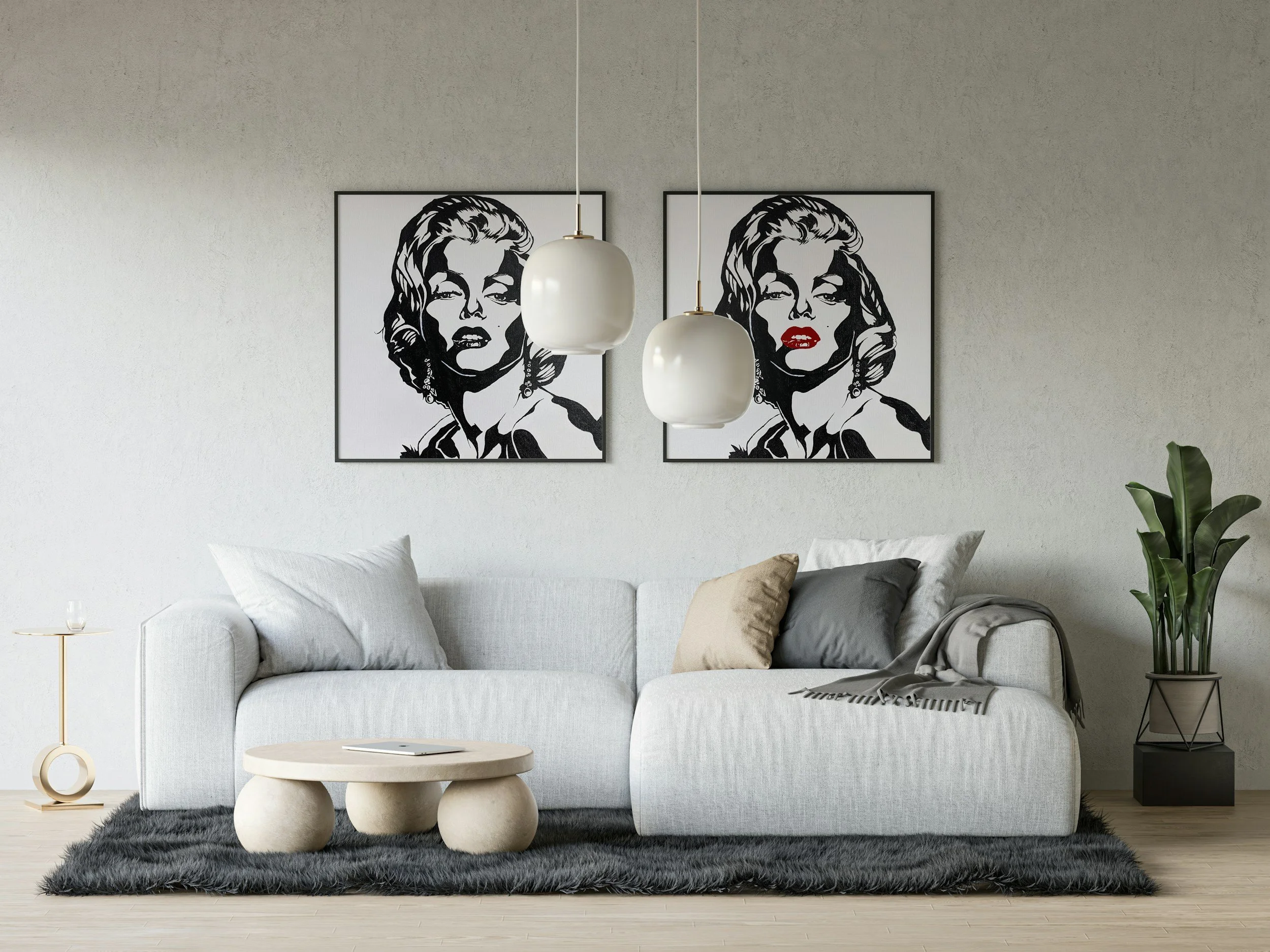 Modern living room with a white sofa, dual hanging white pendant lights, two black-and-white pop art portraits of women on the wall, a black fur rug, a small round beige coffee table, throw pillows, and a potted plant.