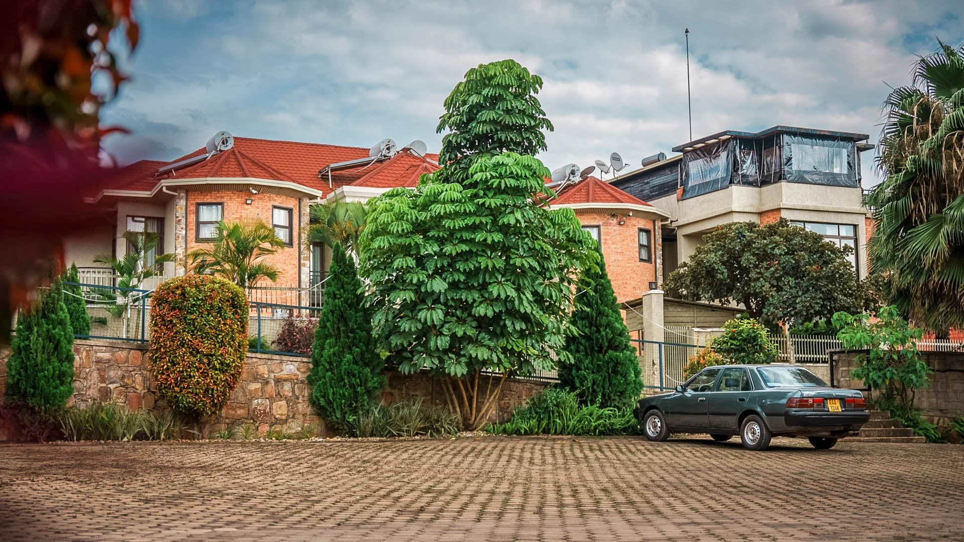 Many guests enjoy the rooftop lounge on the right side of the property,