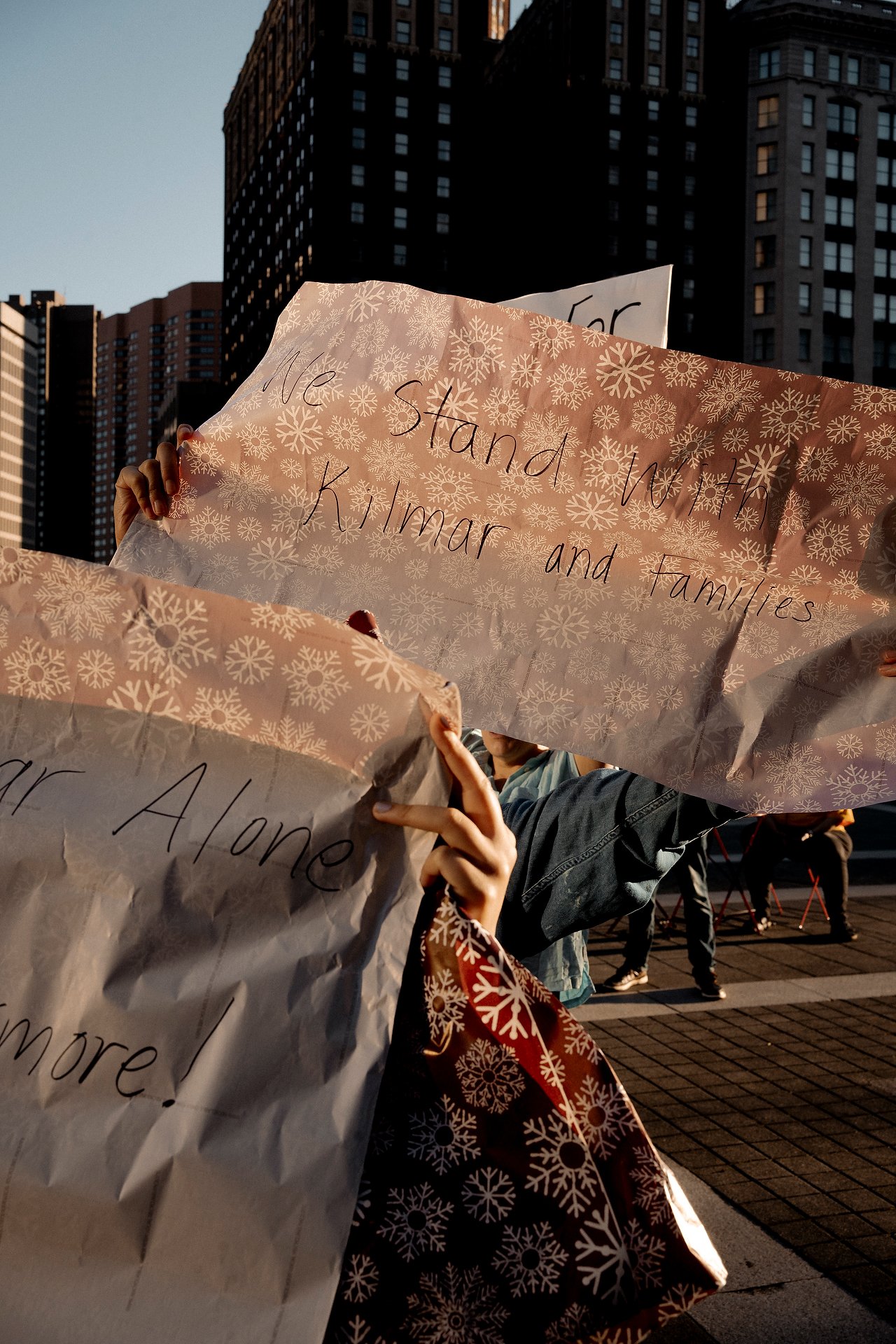 Supporters protest outside a courthouse in Baltimore, Maryland holding signs as Kilmar Abrego Garcia risks deportation.