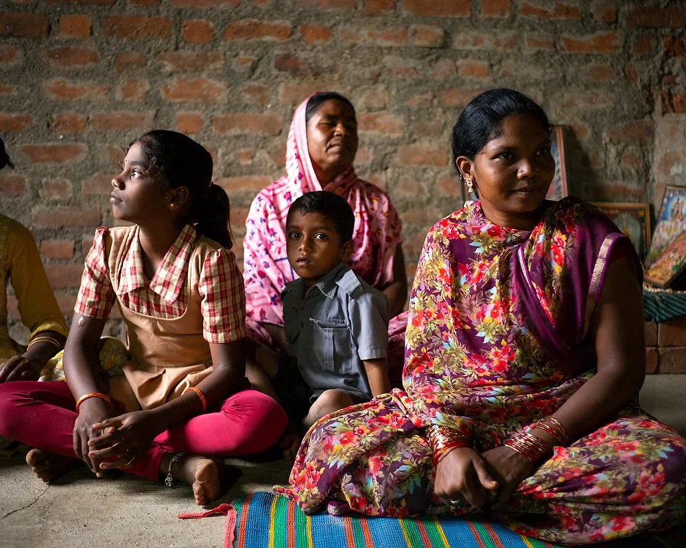 Anita (29) and her 5 children - married at 12, Anita lost her husband to kidney failure caused by years of self-medication to endure hard fieldwork.