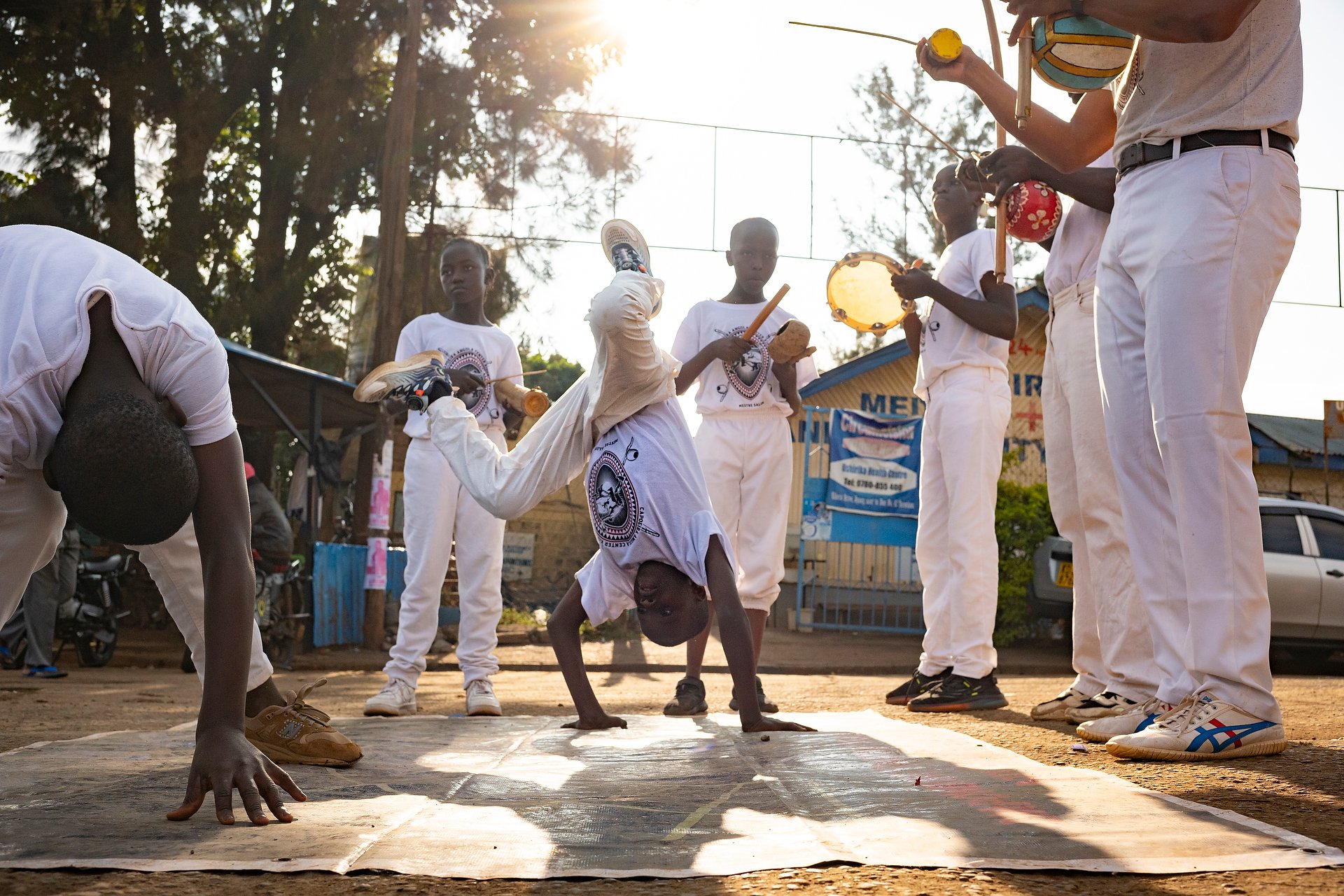 Youth in Nairobi dancing and playing music.