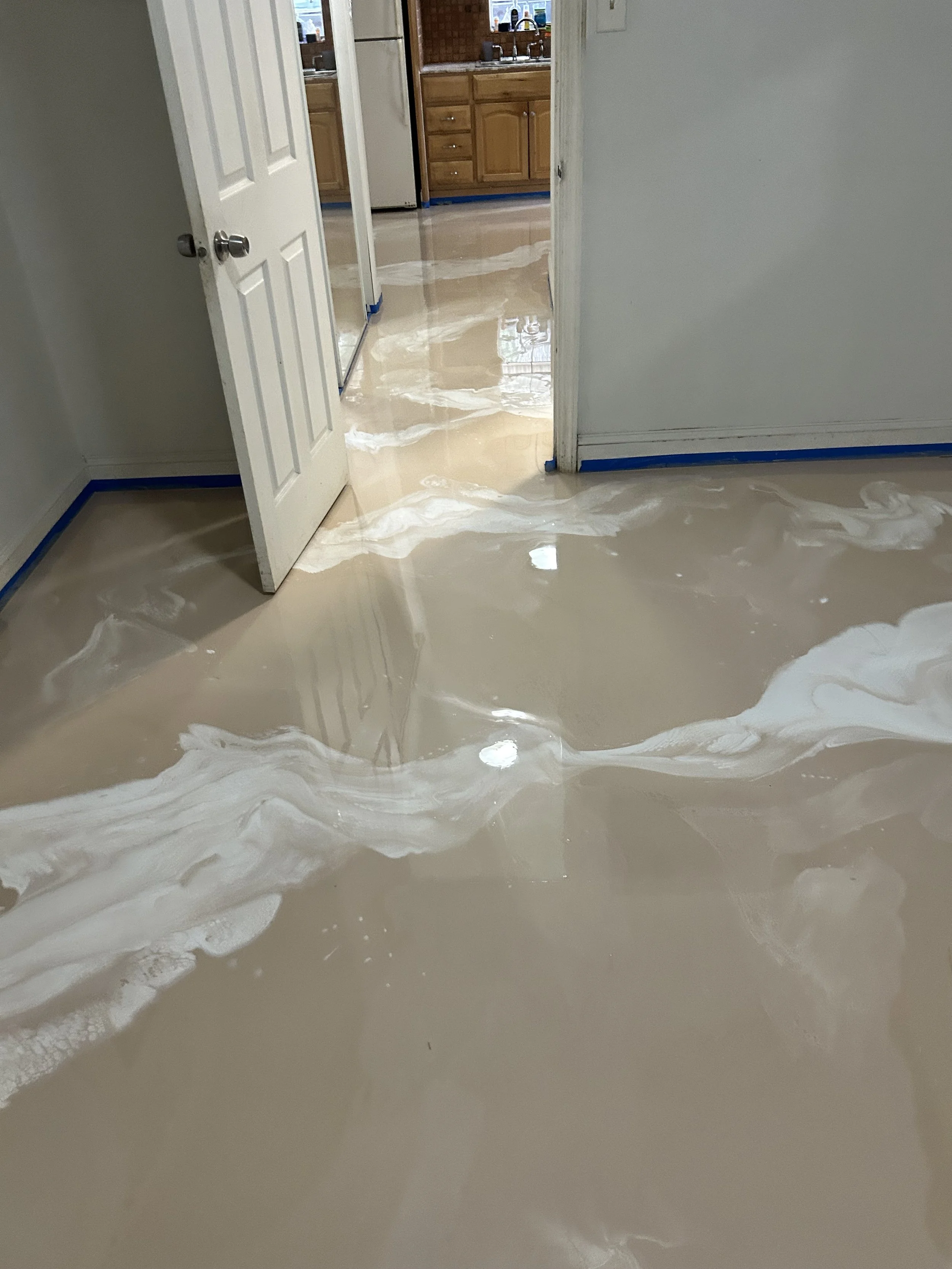 tan epoxy floor in mobile home 