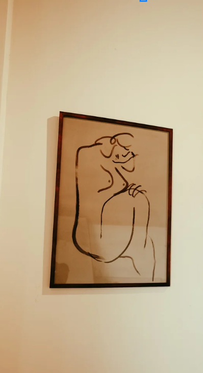 Hang Artwork- Locate and Hang up to 4 pieces of artwork.