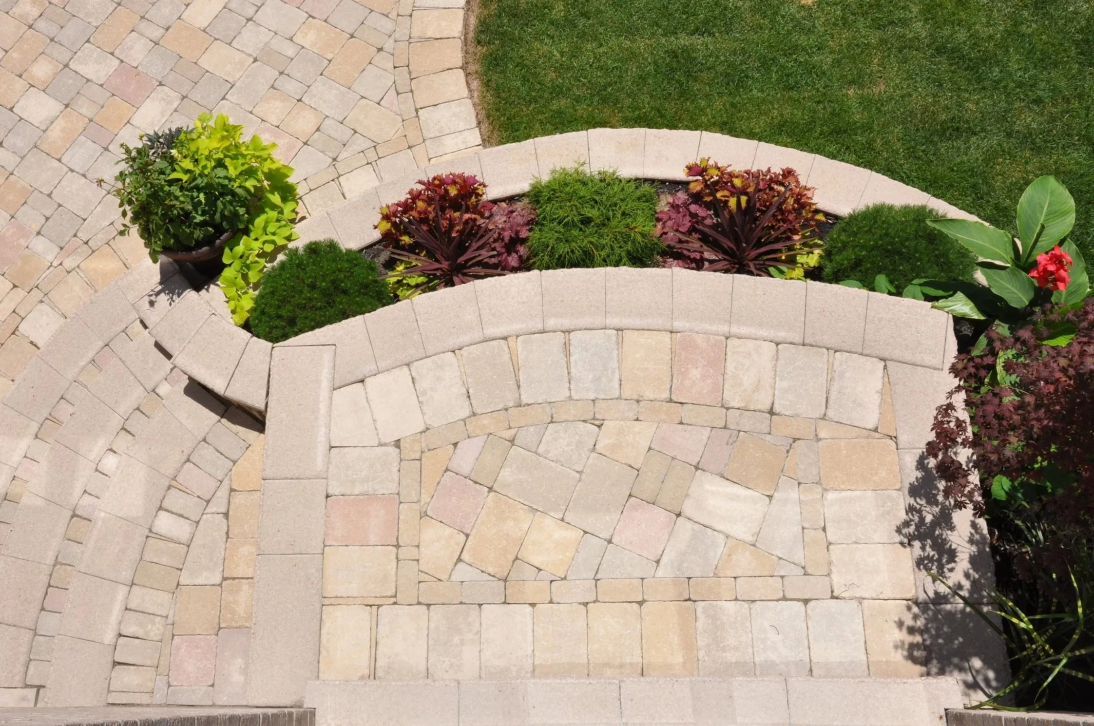 Custom Interlock Steps with Flower Box and Interlock Patio - Maple