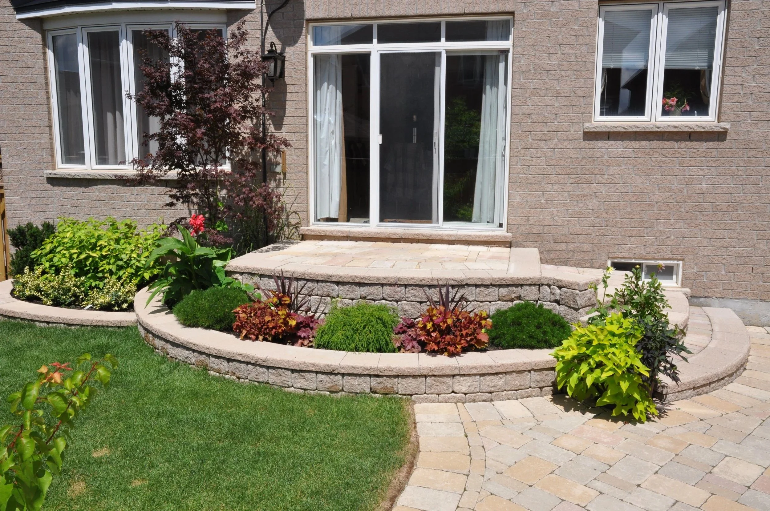 Custom Interlock Steps with Flower Box and Interlock Patio - Maple