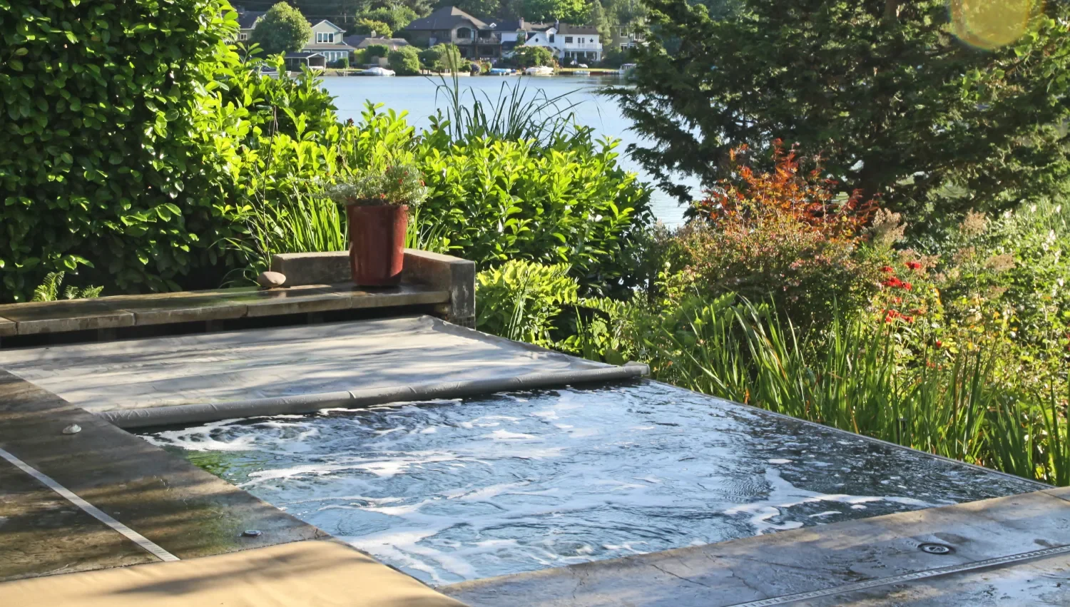 Splash pool and decking overlooking waterfront