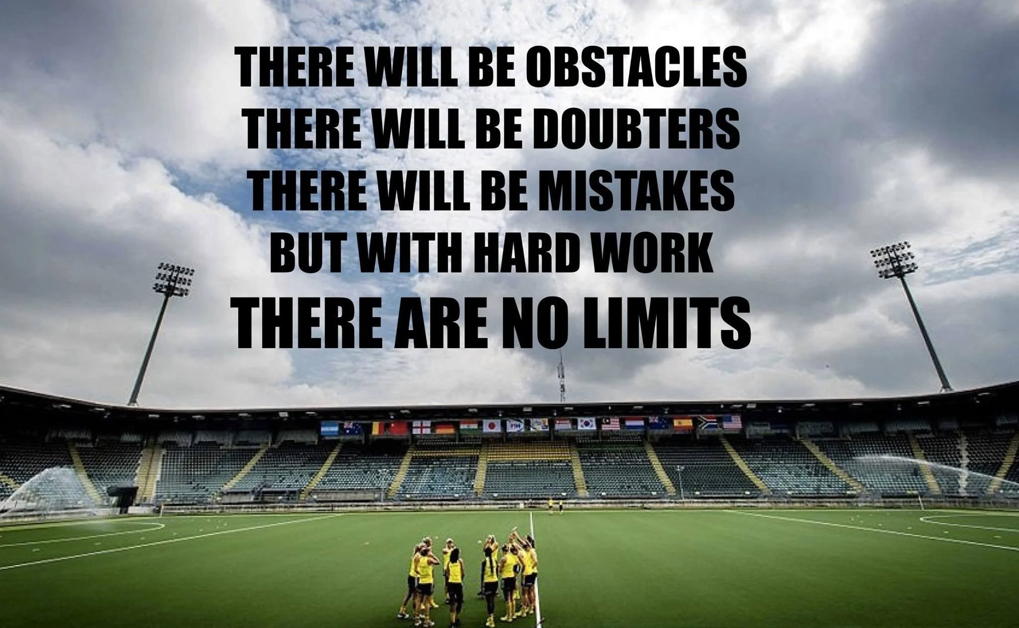 Motivational quote on a cloudy sky over a sports stadium with players on the field: "There will be obstacles, there will be doubters, there will be mistakes, but with hard work, there are no limits."