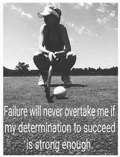 A woman in sporty attire and a cap crouching on a tennis court, holding a tennis racket with a ball nearby, under a partly cloudy sky.