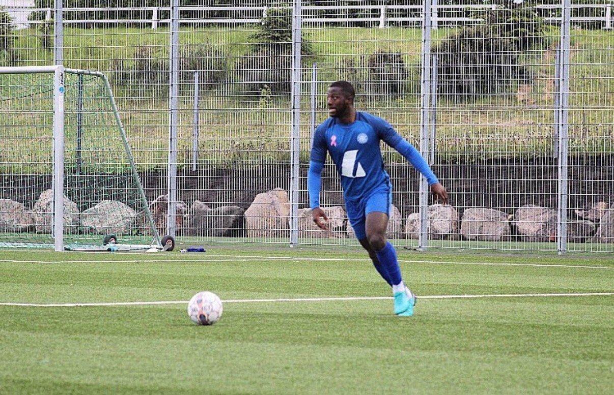 Kelvin, personal training client, playing football