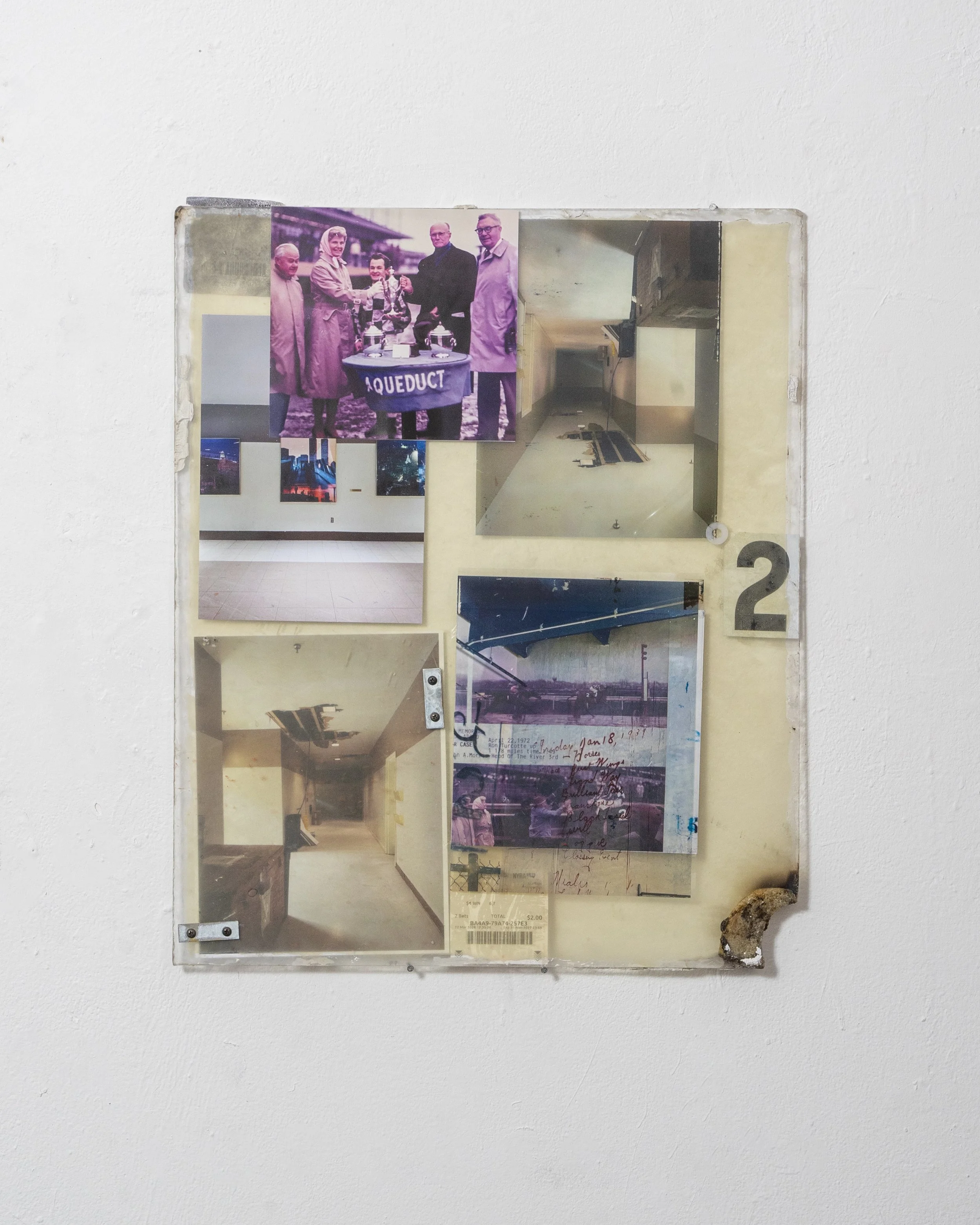 Skin

25.5x21 inches
2026
Site specific plastic, inkjet prints, 
transparency paper, fasteners, 
screws, plastic washers, glue, 
dust, betting receipts, 
the continual psychological weight of 9/11