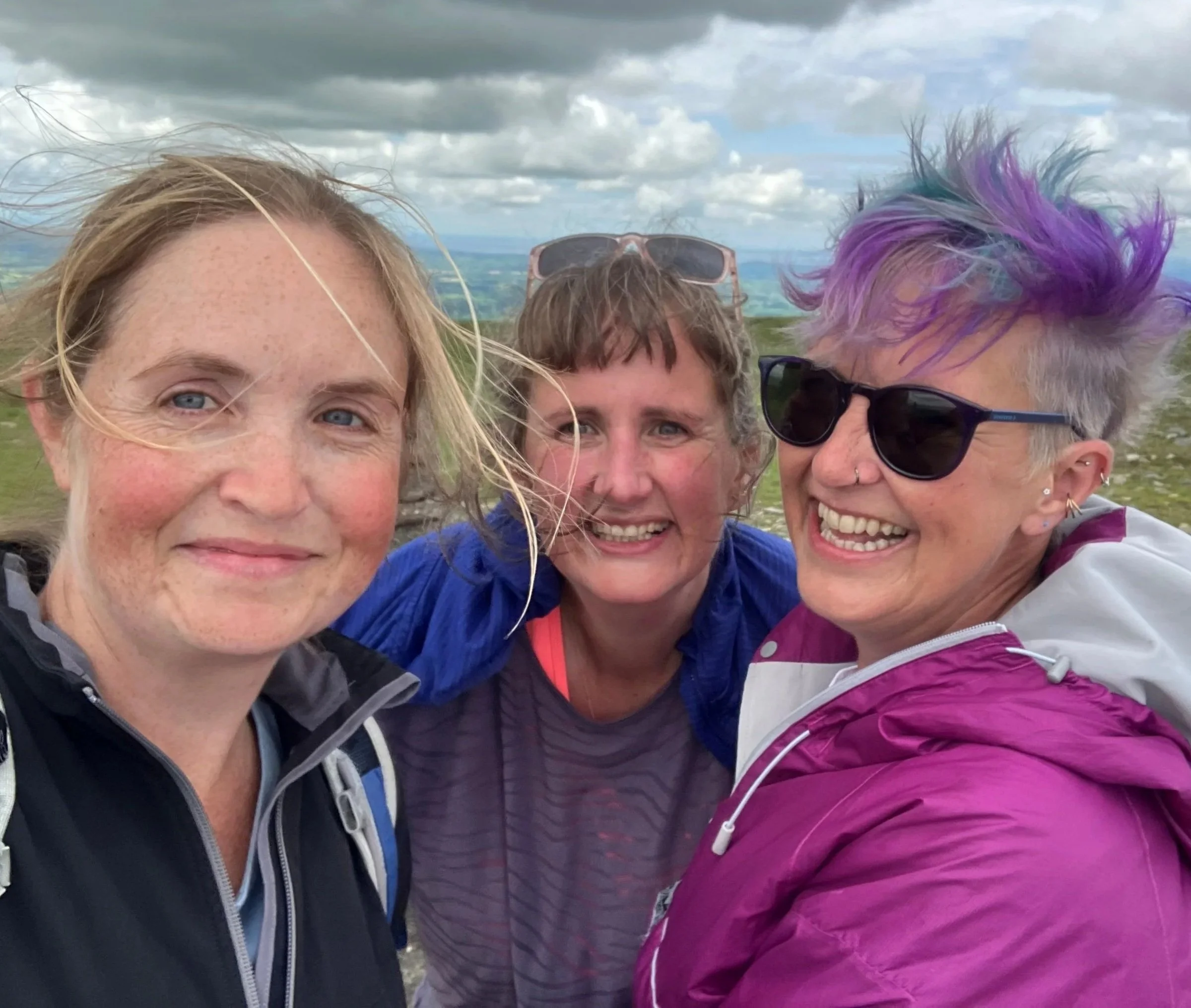 From left to right; Sarah, Ruth and Olivia with wild hair out for a windy walk
