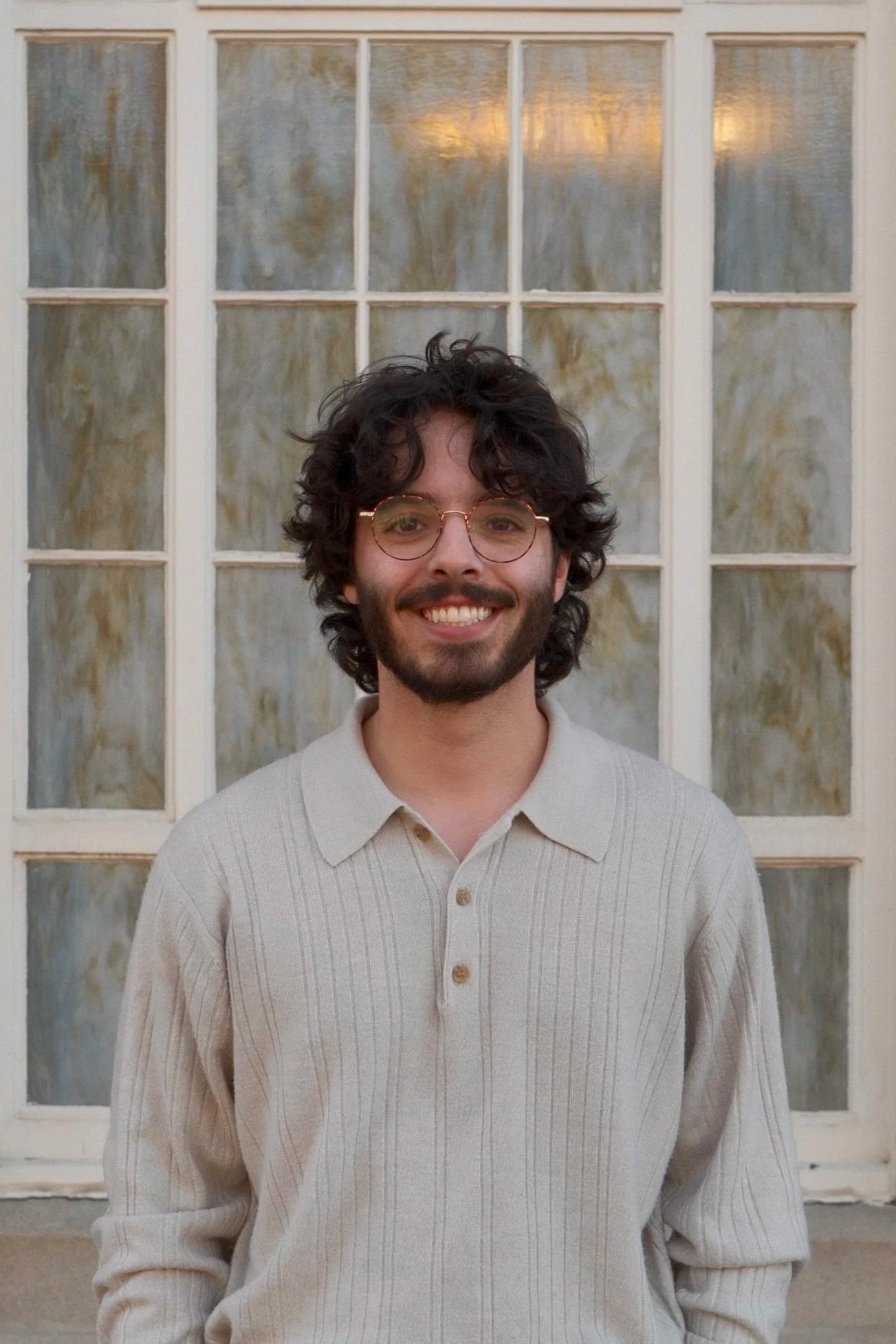 Joshua Korac, licensed professional counselor in Colorado, standing outside and smiling