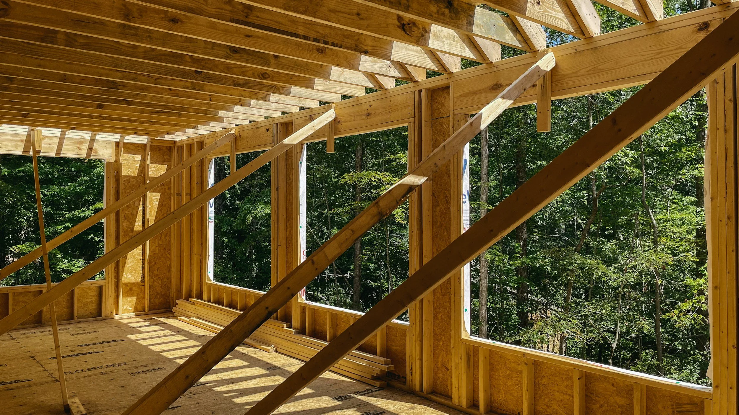 Carpentry framework, timber holding a wall, rafters placed on joists