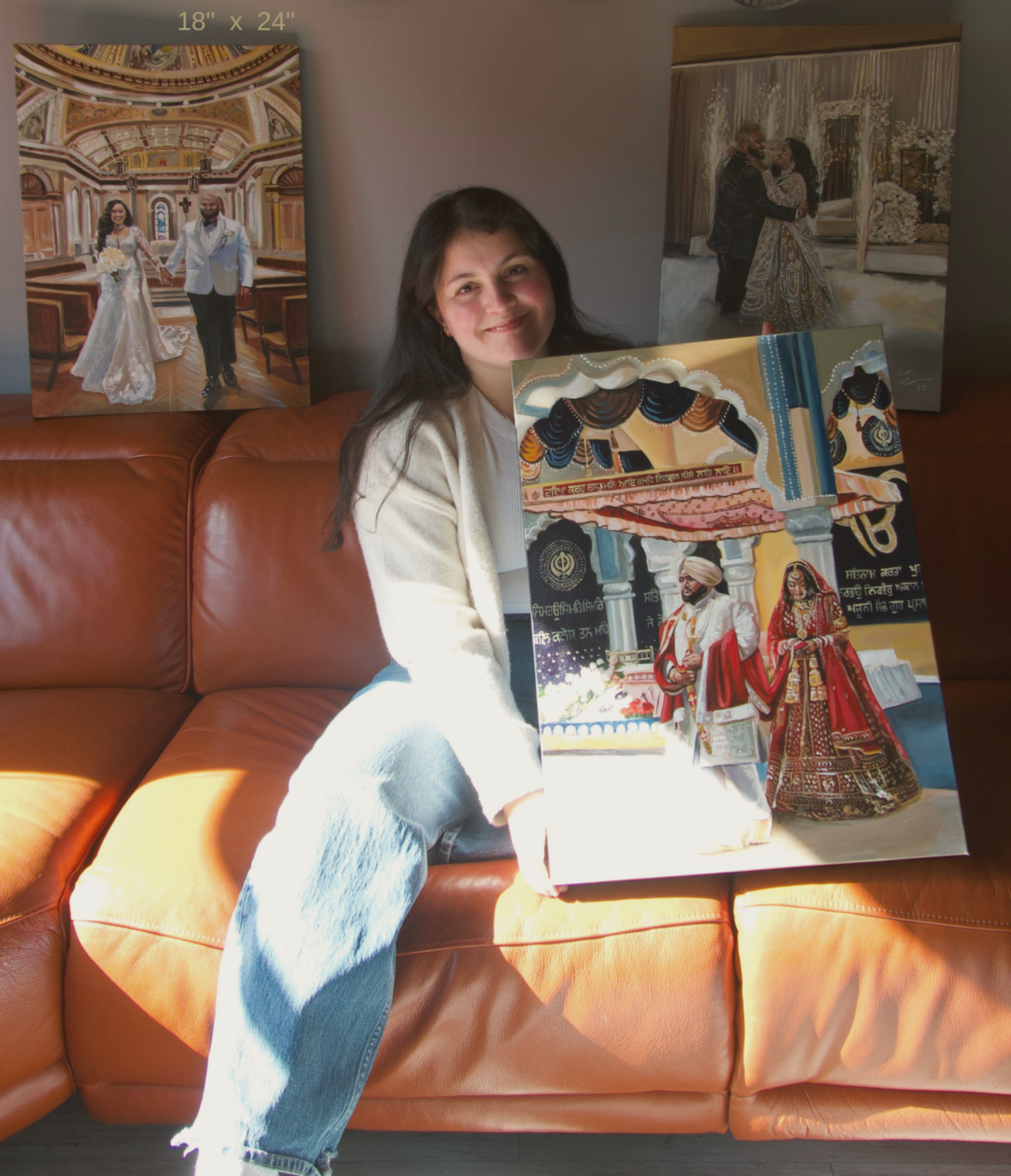 Live wedding artist Catarina Cruzeiro surrounded by three 18 by 24" live paintings that she created. One painting is of a sikh wedding ceremony (anand karaj), another is a live painting of a first dance, and a church ceremony painting