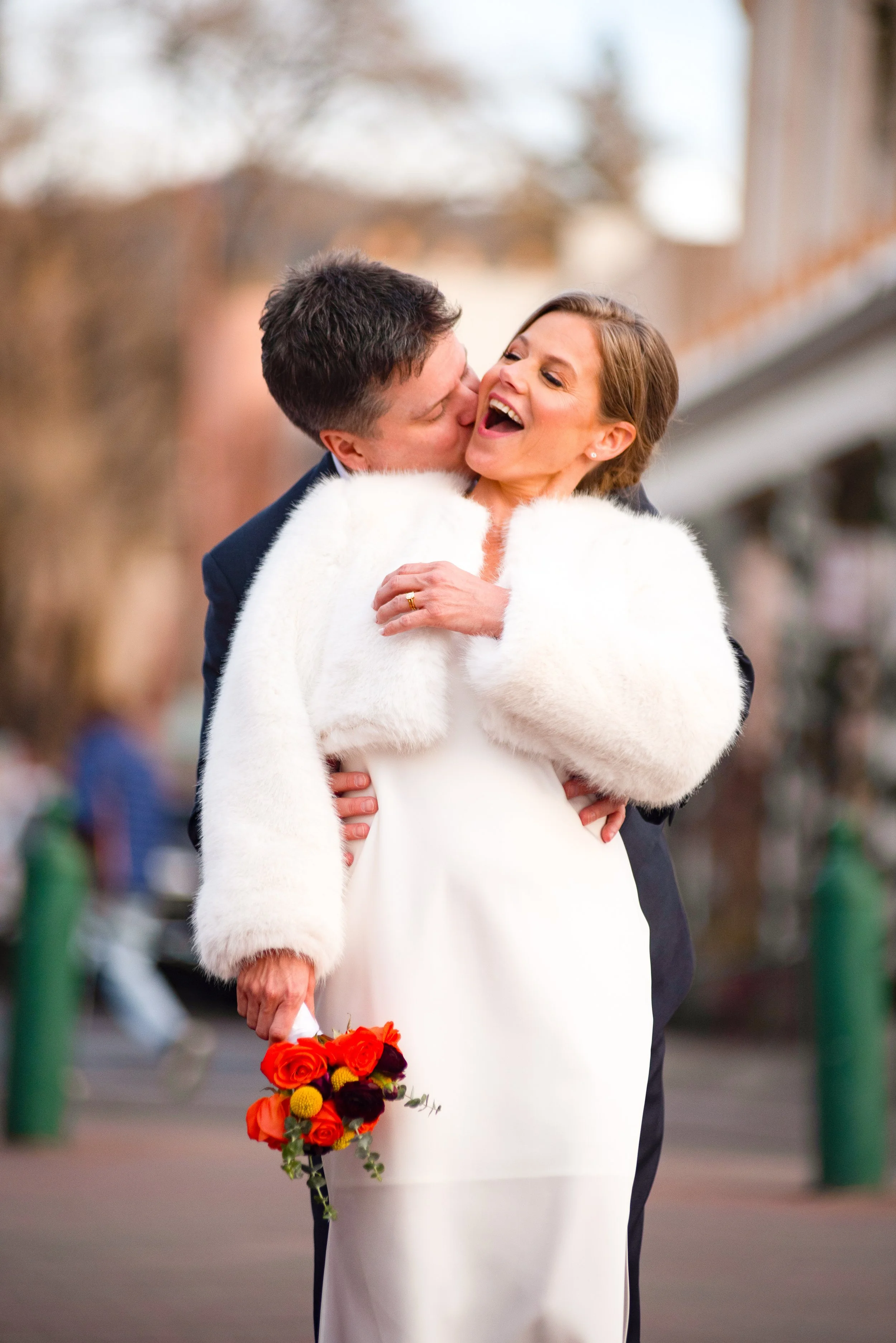 La Fonda De Santa Fe - Beautiful Couple have fun walking in the Santa Fe Plaza after their wedding at the historic La Fonda Hotel