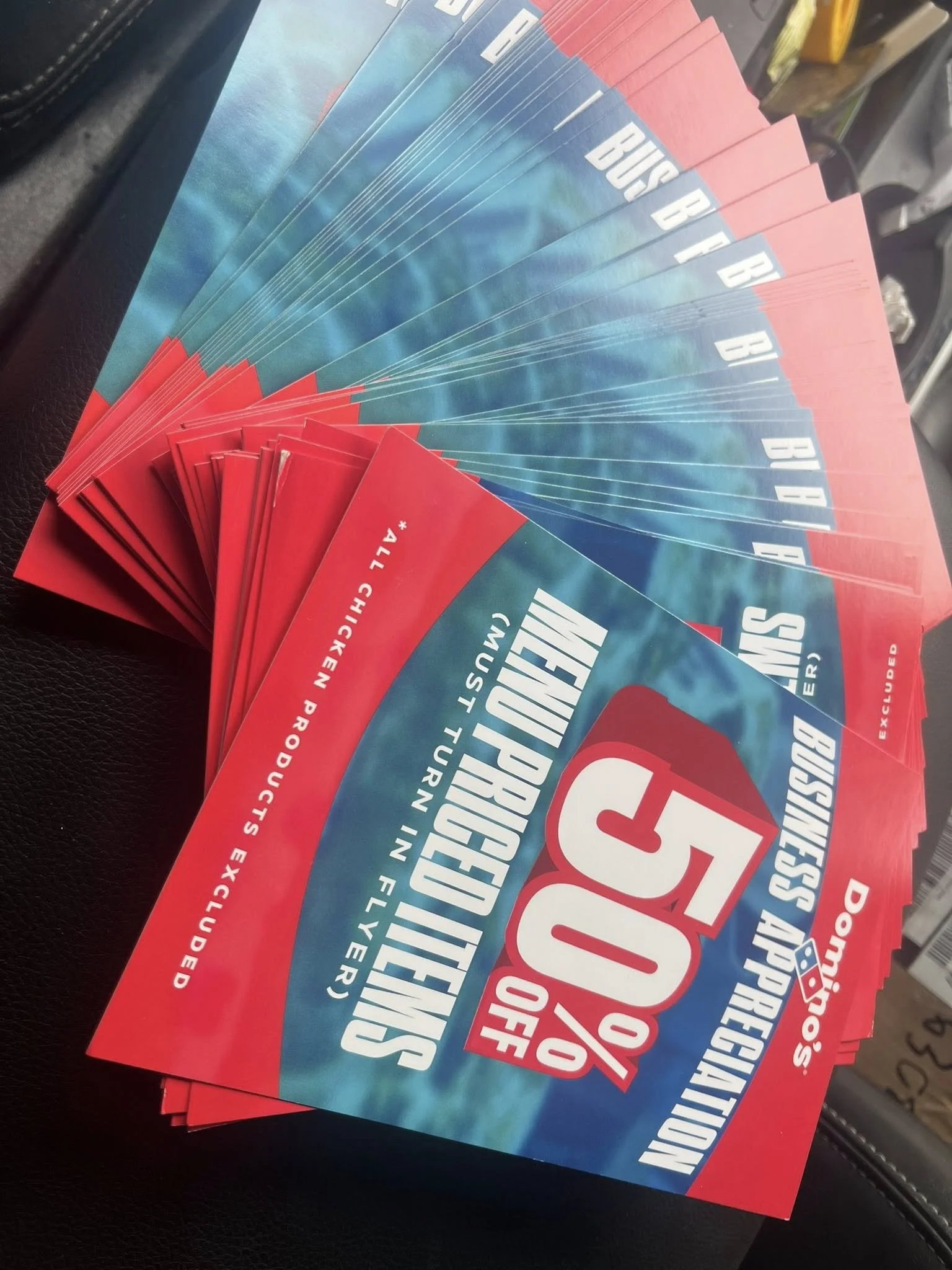 Promotional flyers for a business open house offering 50% off on new projects, featuring chicken products.