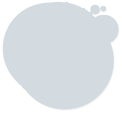 Blue ink blot with several smaller ink spots attached to the top right.