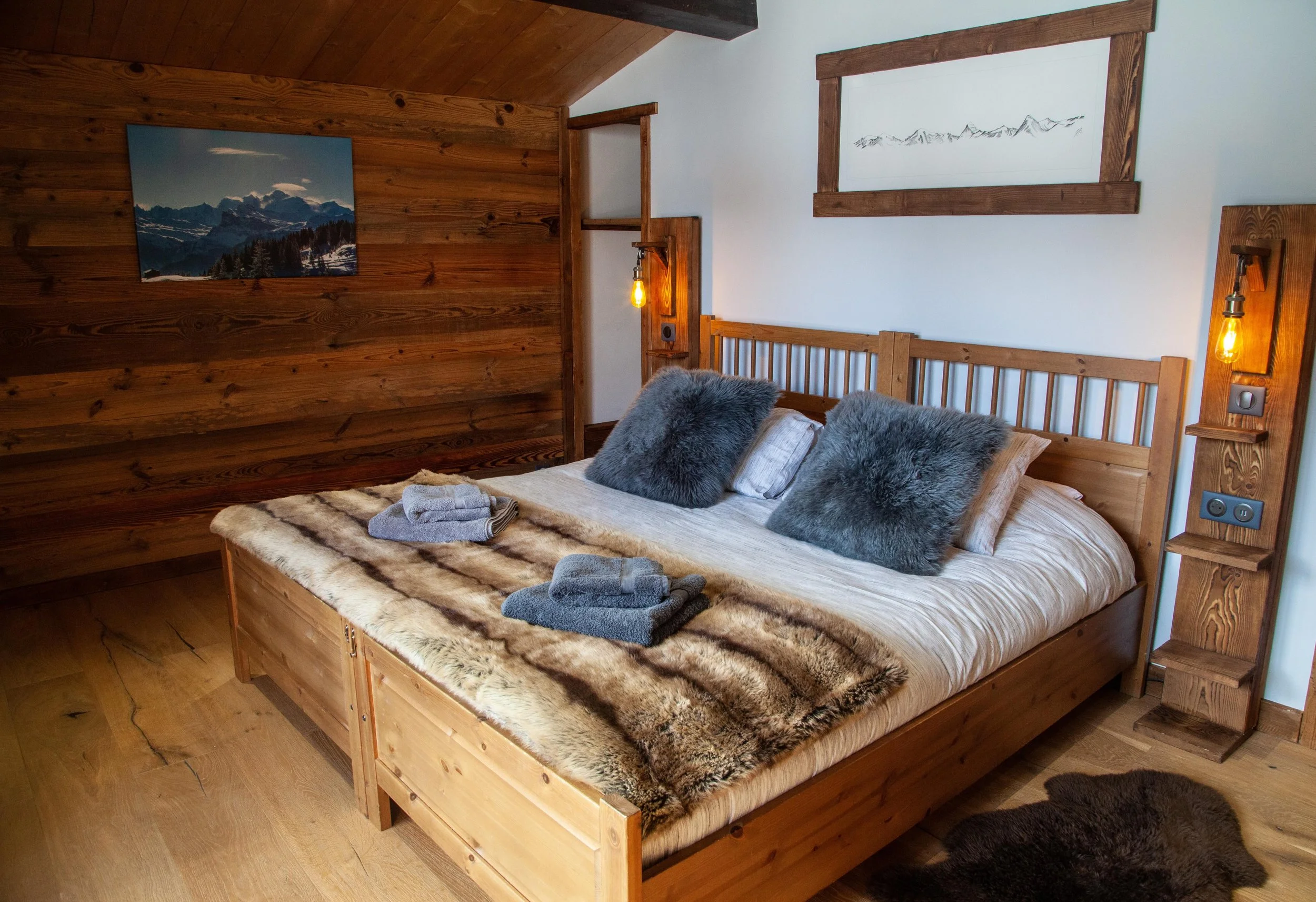 Rustic Alpine double bedroom in Les Gets luxury group chalet accommodation.