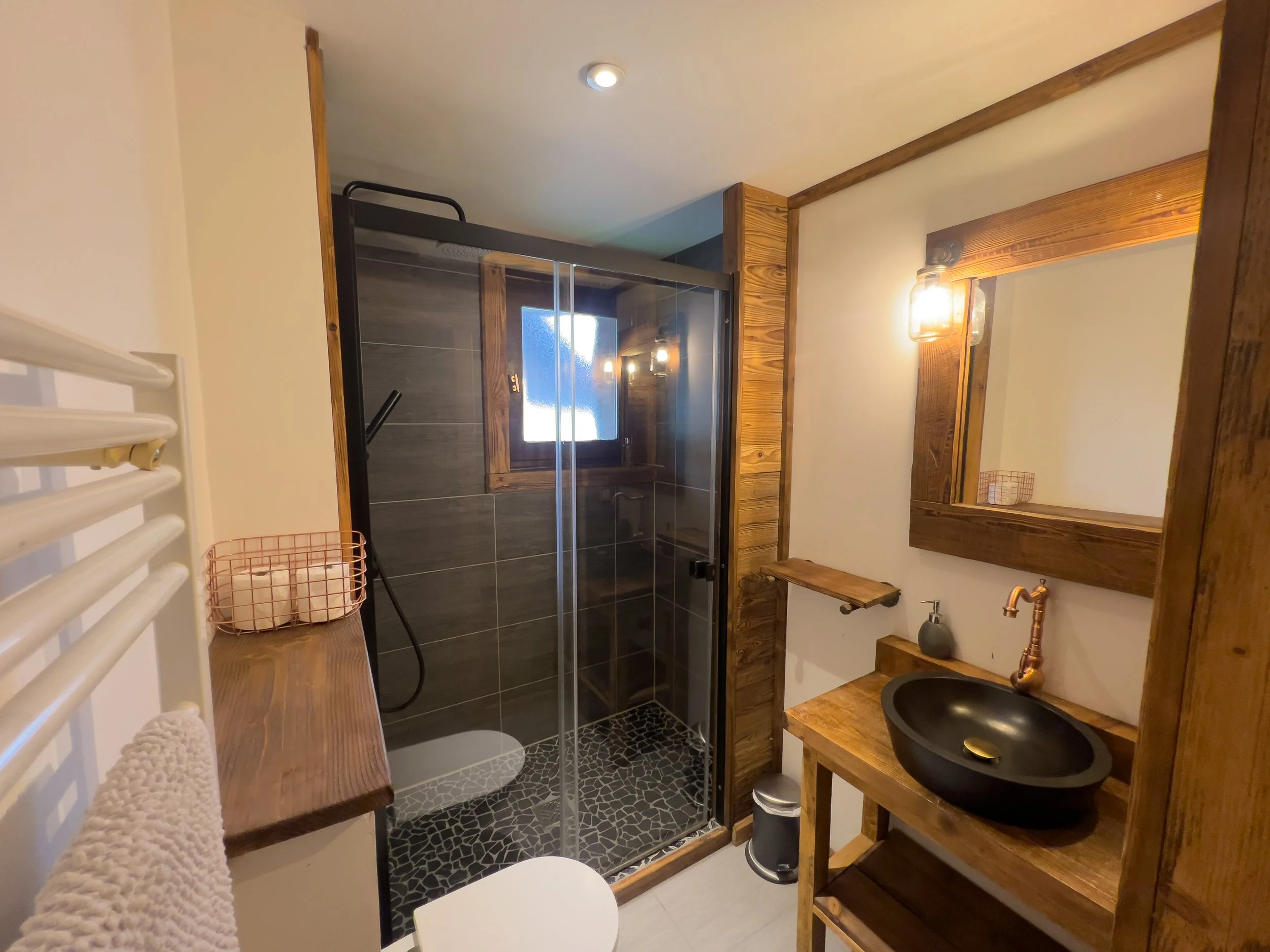 Modern ensuite bathroom in Chalet Sandy, Les Gets with walk-in shower.