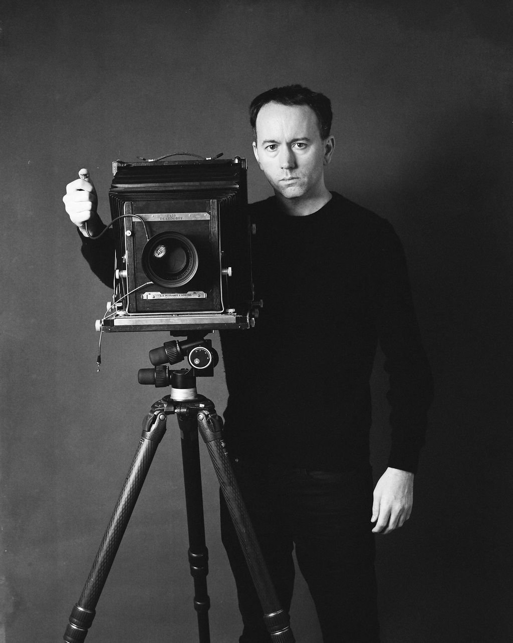 Artist portrait shot on black and white medium format film in Hollywood, CA. Built for editorial, web, and social presence.