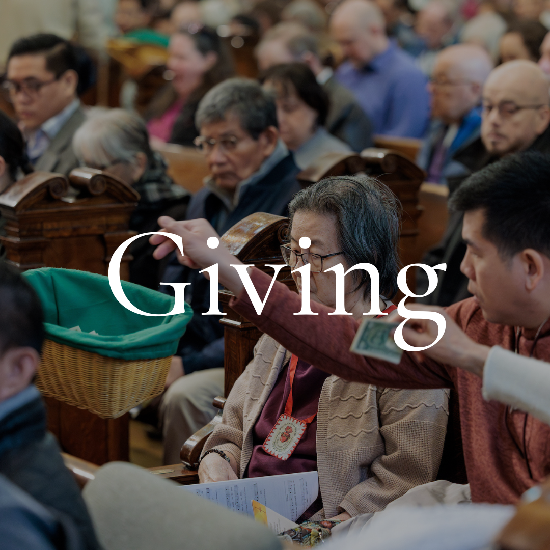 People seated in a church during a giving collection, passing money to a basket.