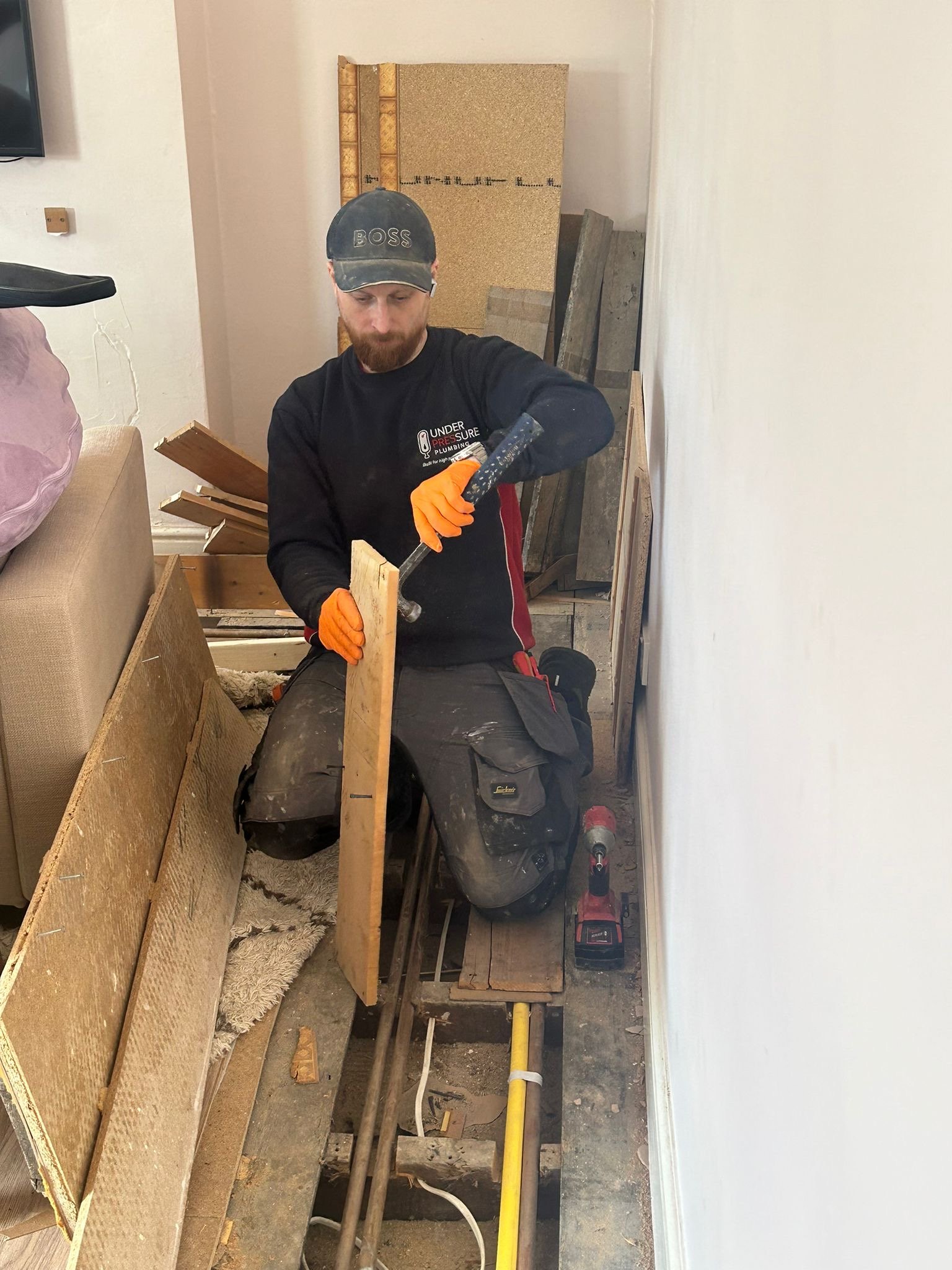 Under Pressure Plumbing engineer carrying out plumbing installation and upgrade work at a property in East London.