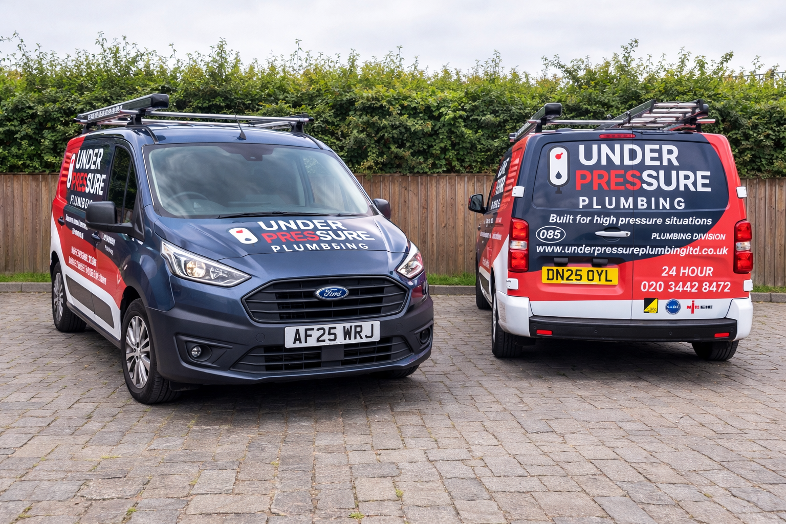 Two Under Pressure Plumbing branded service vans ready to provide emergency plumbing services across North London.