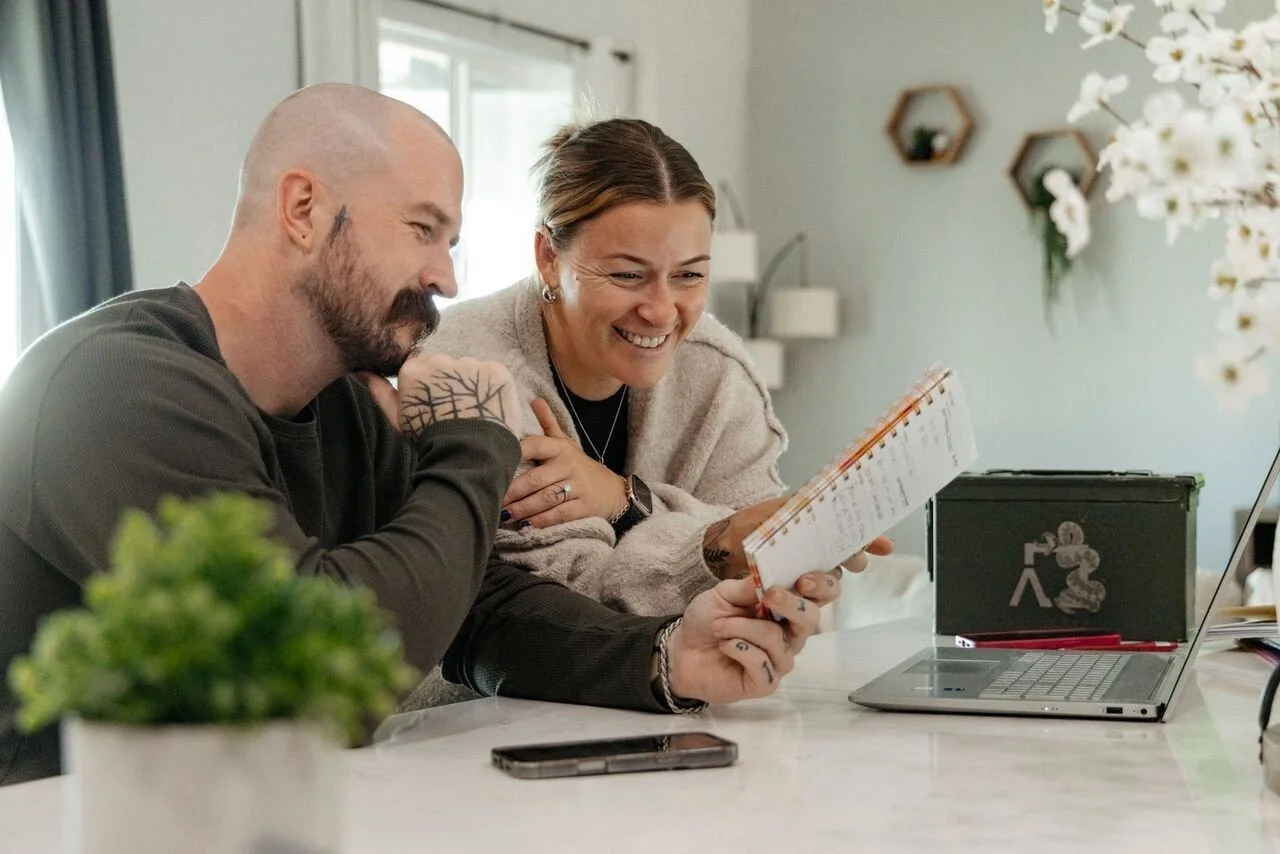Couple at the table planning for date night