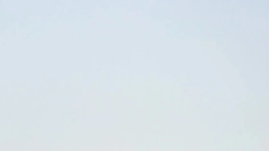 Empty light gray background with slight gradient