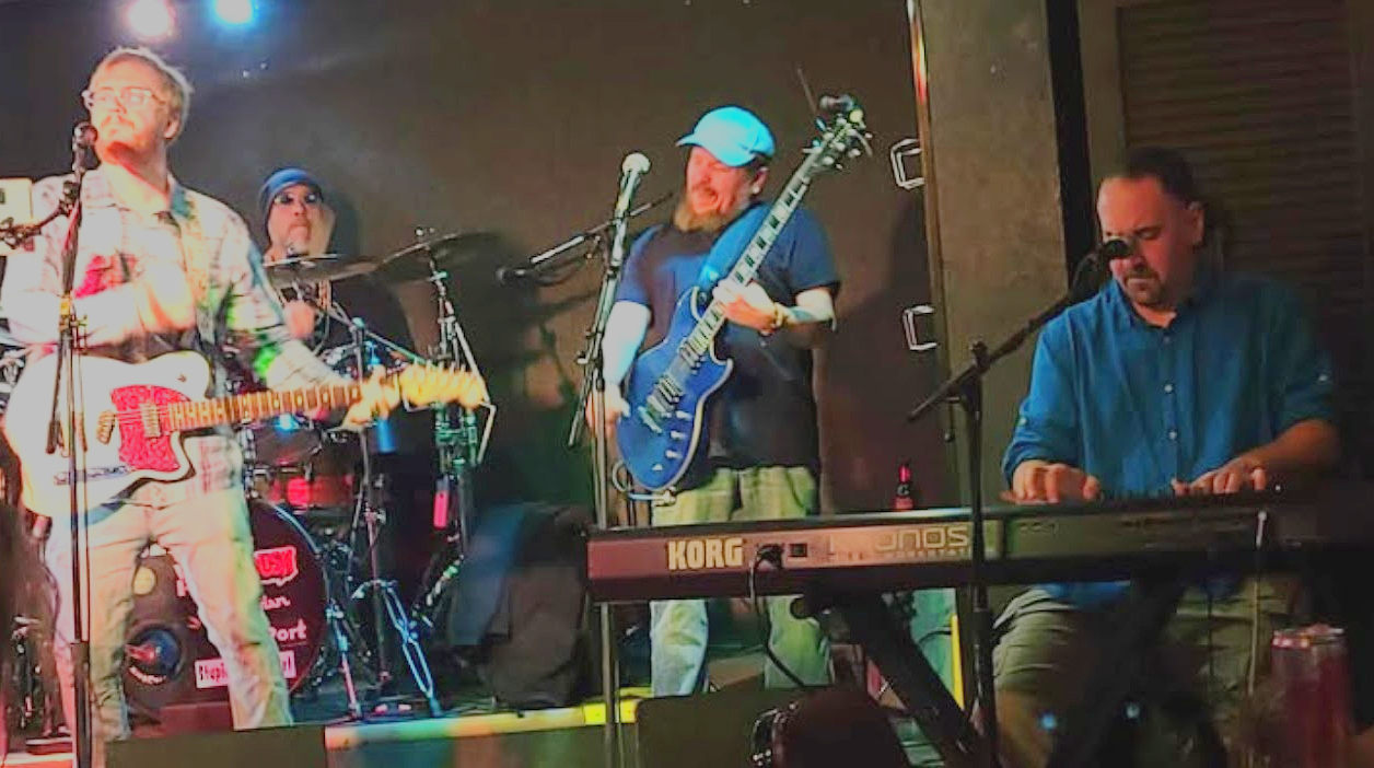 Playing keyboards for Chaos Protocol at the Corunna Road Bar.