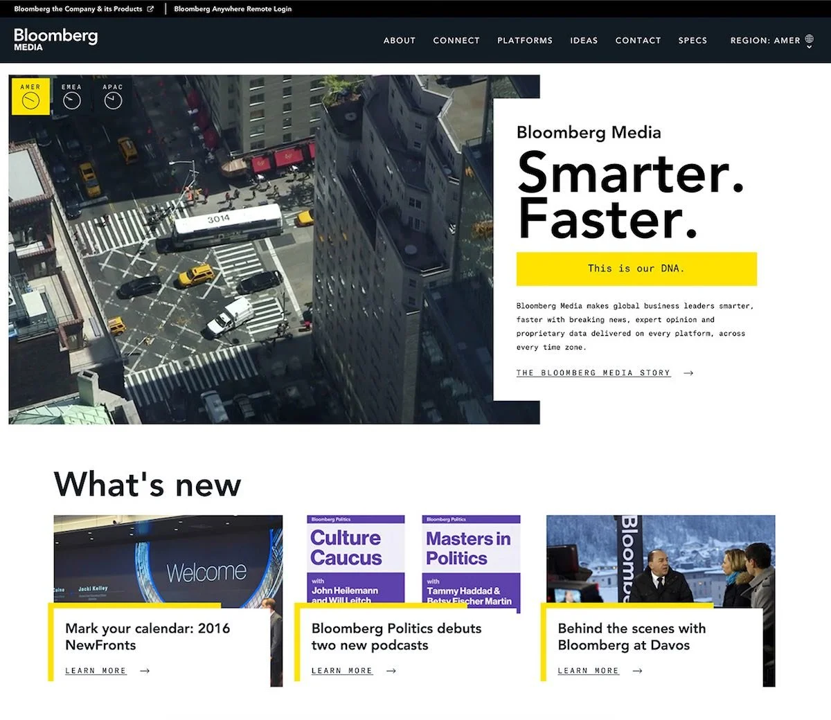 A screenshot of Bloomberg Media website featuring a bird's eye view of a city intersection with cars and pedestrians, and sections about news, podcasts, and behind-the-scenes stories.