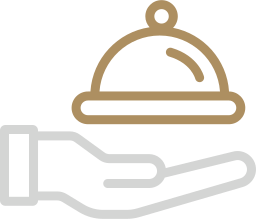 Hand holding a serving tray with a covered dish