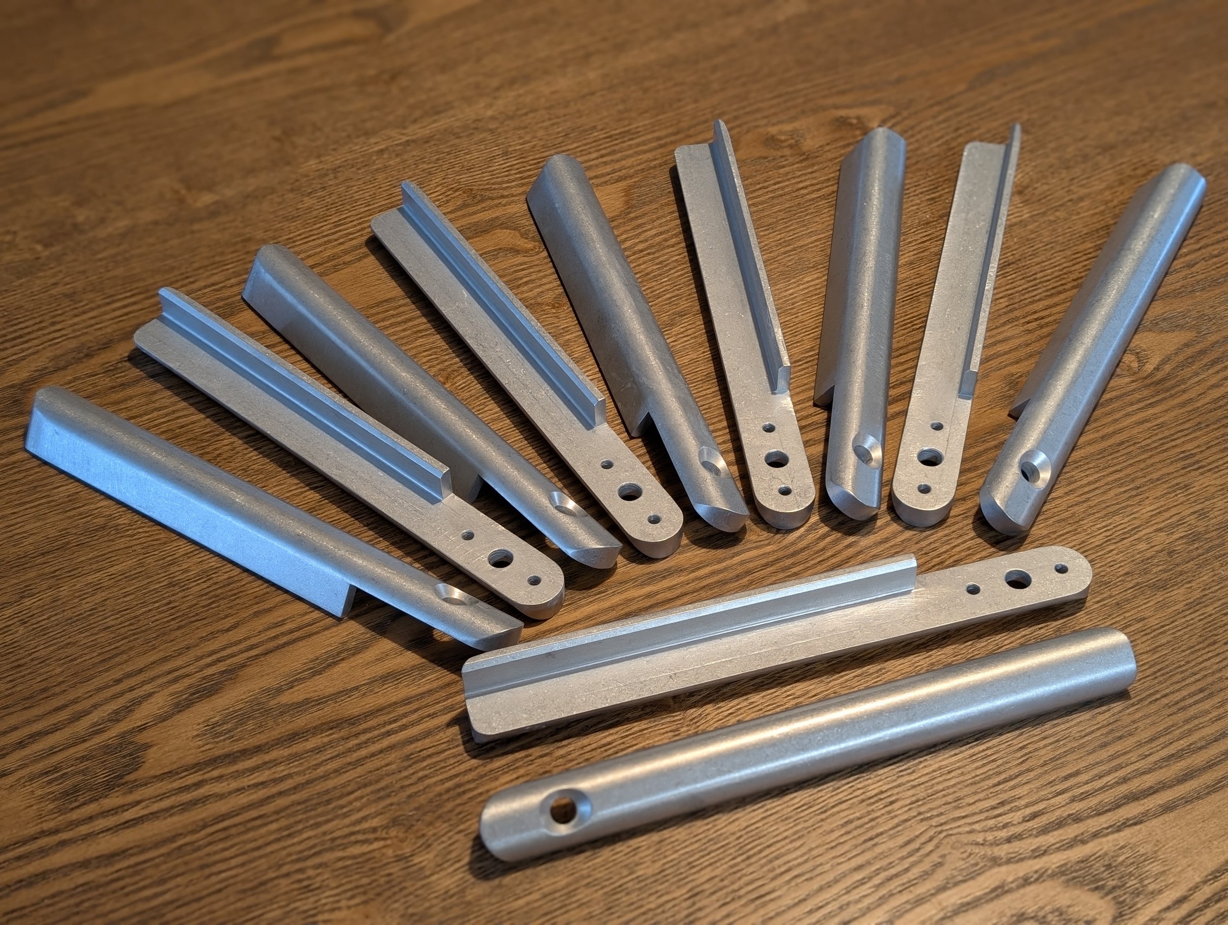 Small batch of machined aluminum components for an aerospace customer.