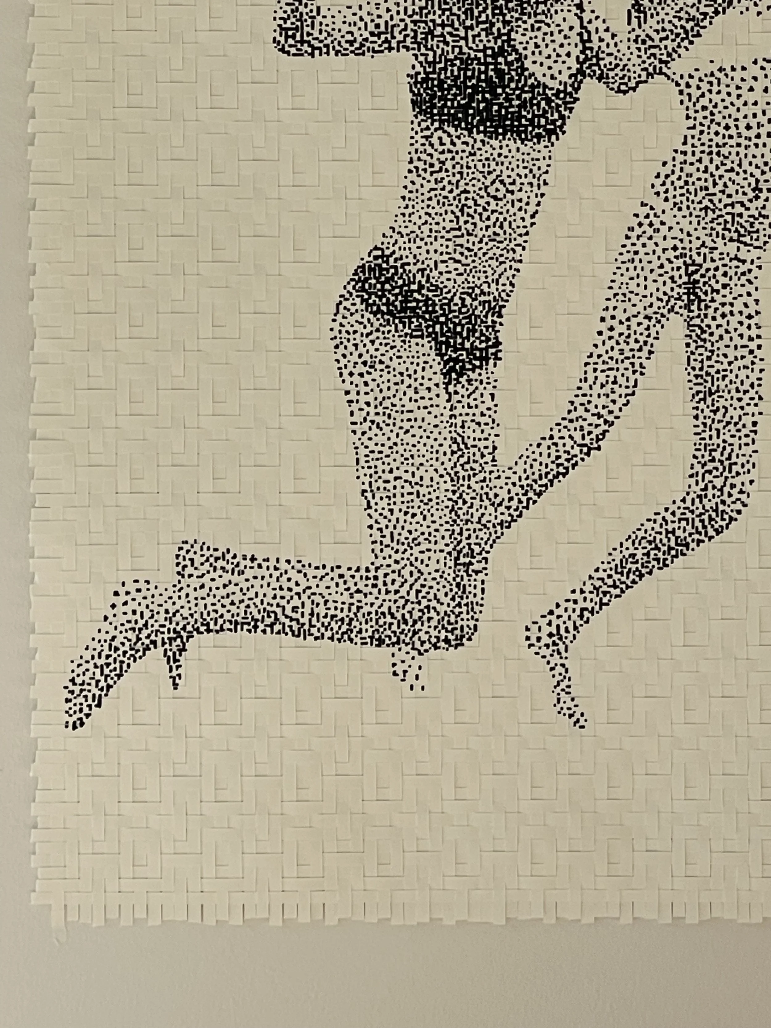 Pixel art of a woman kneeling with a hand on her shaved head, created with black dots on a beige textured background.