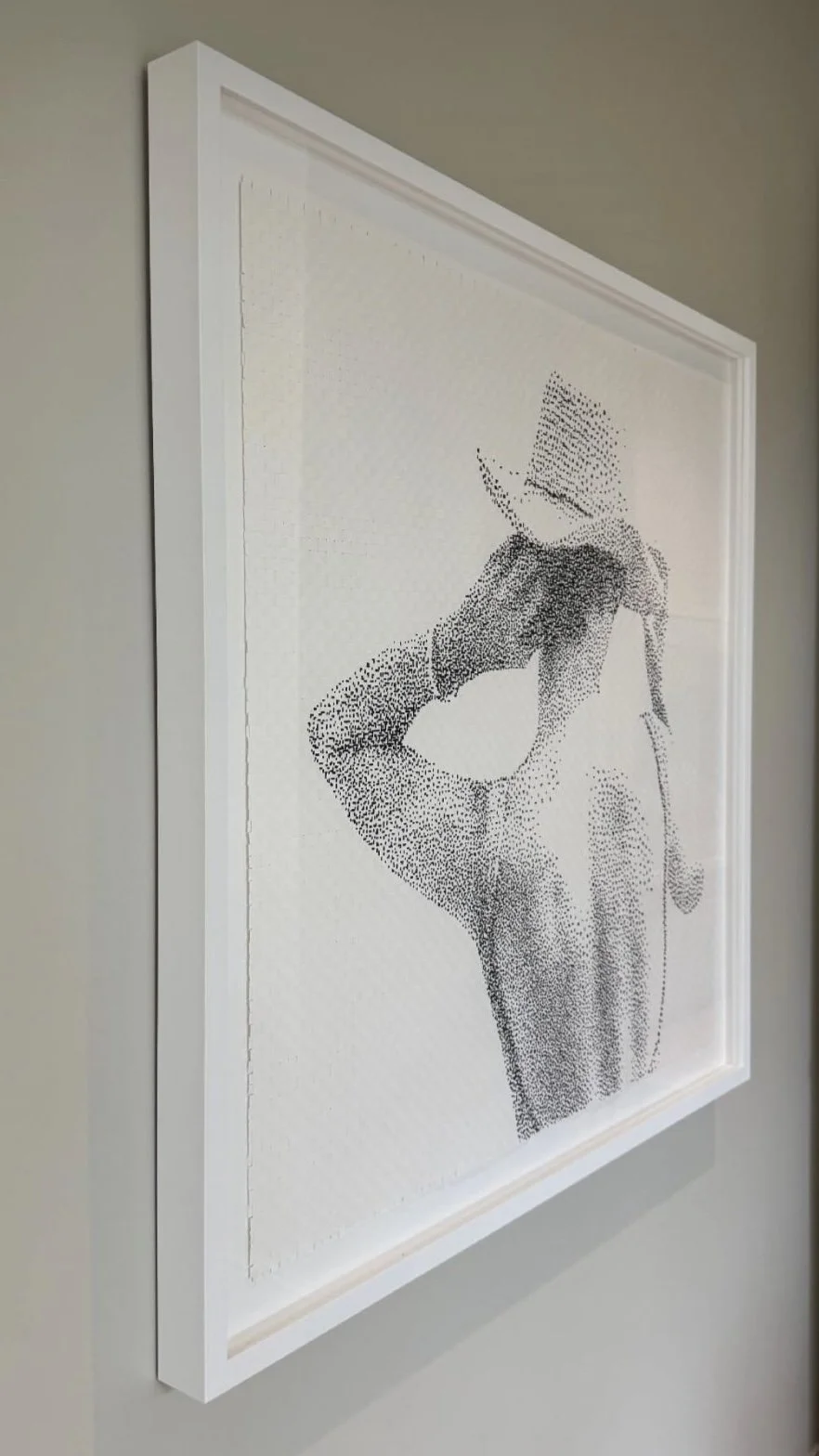 Arrow pointing to woman in black top and jeans, with a handbag, depicted in pointillism art style.