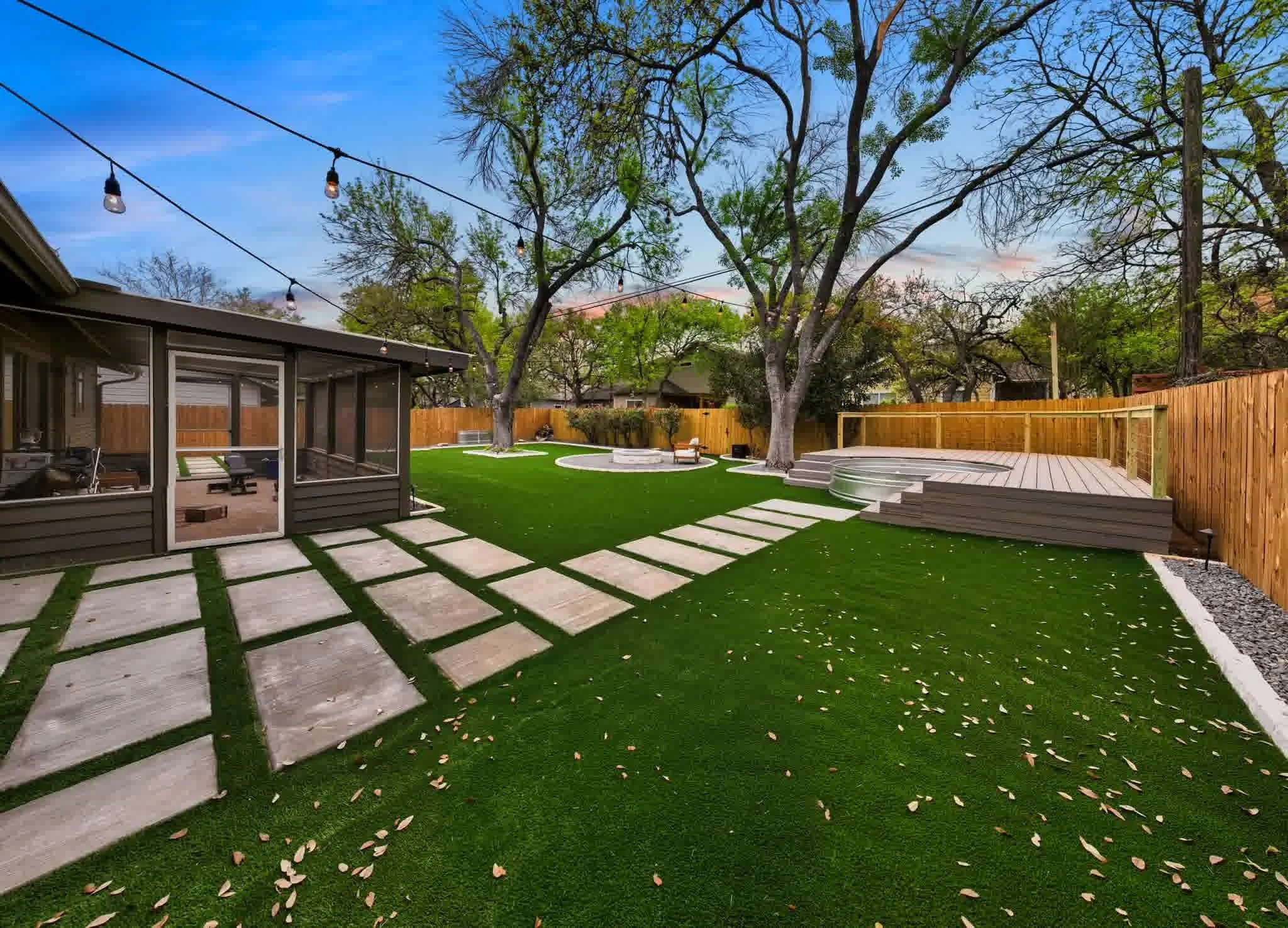 A satisfied and happy clients lawn after a full artificial turf installation.