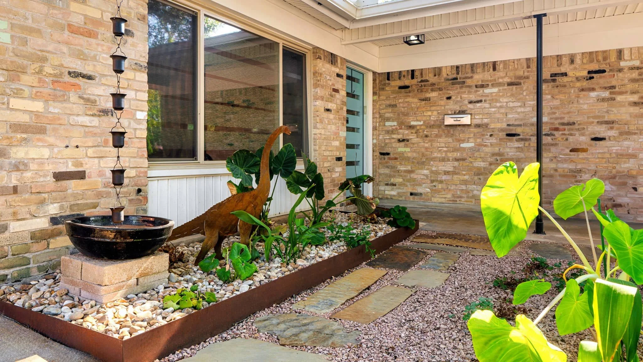 Natural outdoor landscape with mature trees, gravel groundcover, and clean borders — Southern Love