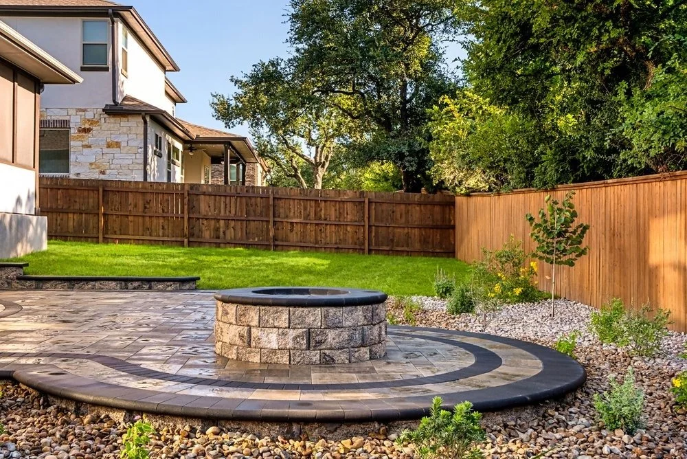 A matching firepit and patio that is ready for some cozy furniture.