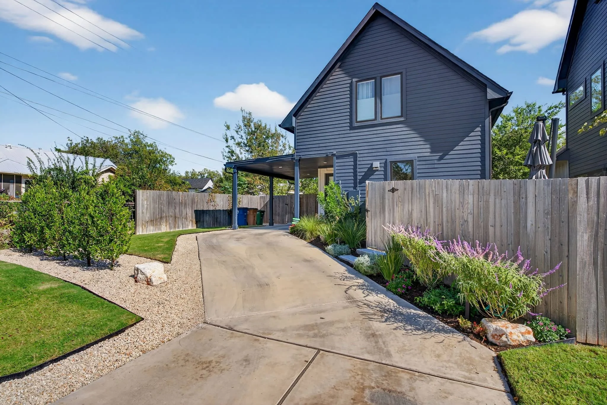 Small-space landscape design with organized planting and private outdoor seating — Southern Love